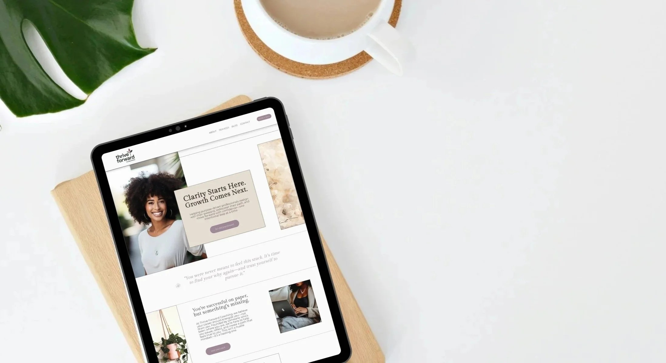 Tablet displaying a website with the text 'Clarity Starts Here. Growth Comes Next.'  A squarespace template for coaches
