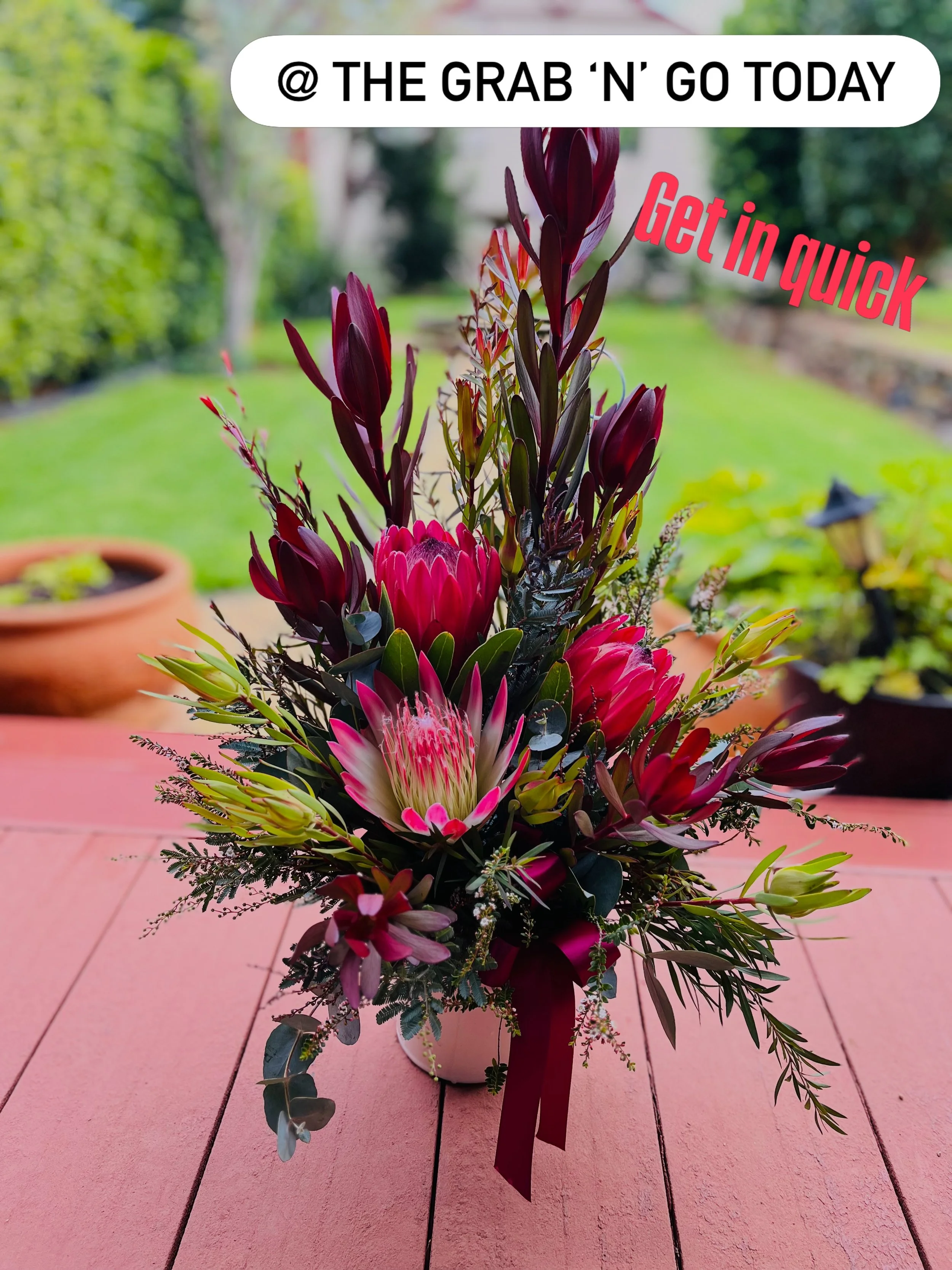 Gorgeous ceramic pot with some gorgeous locally grown proteas and silvan red lucs!  #shoplocal