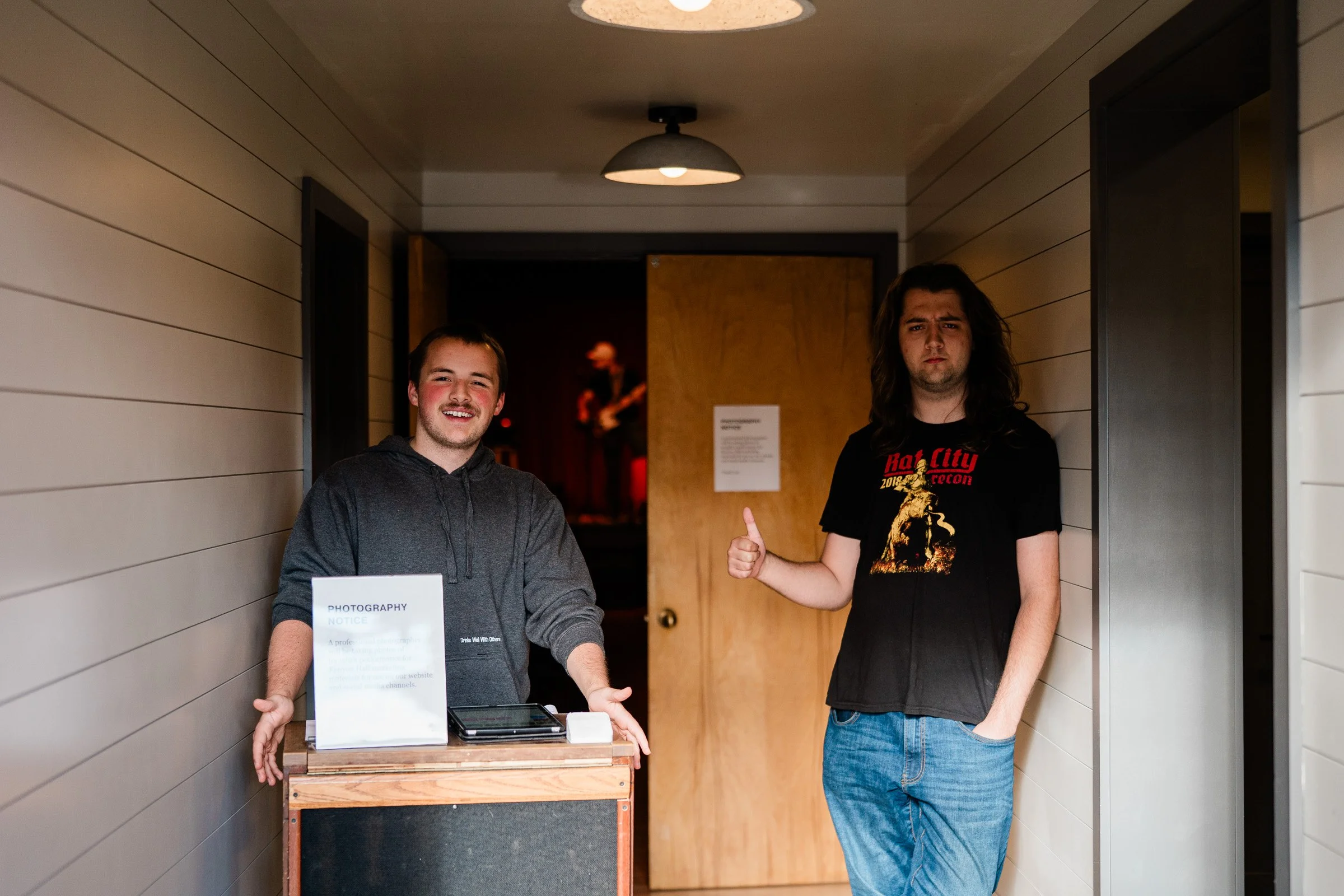 Two volunteers working tickets
