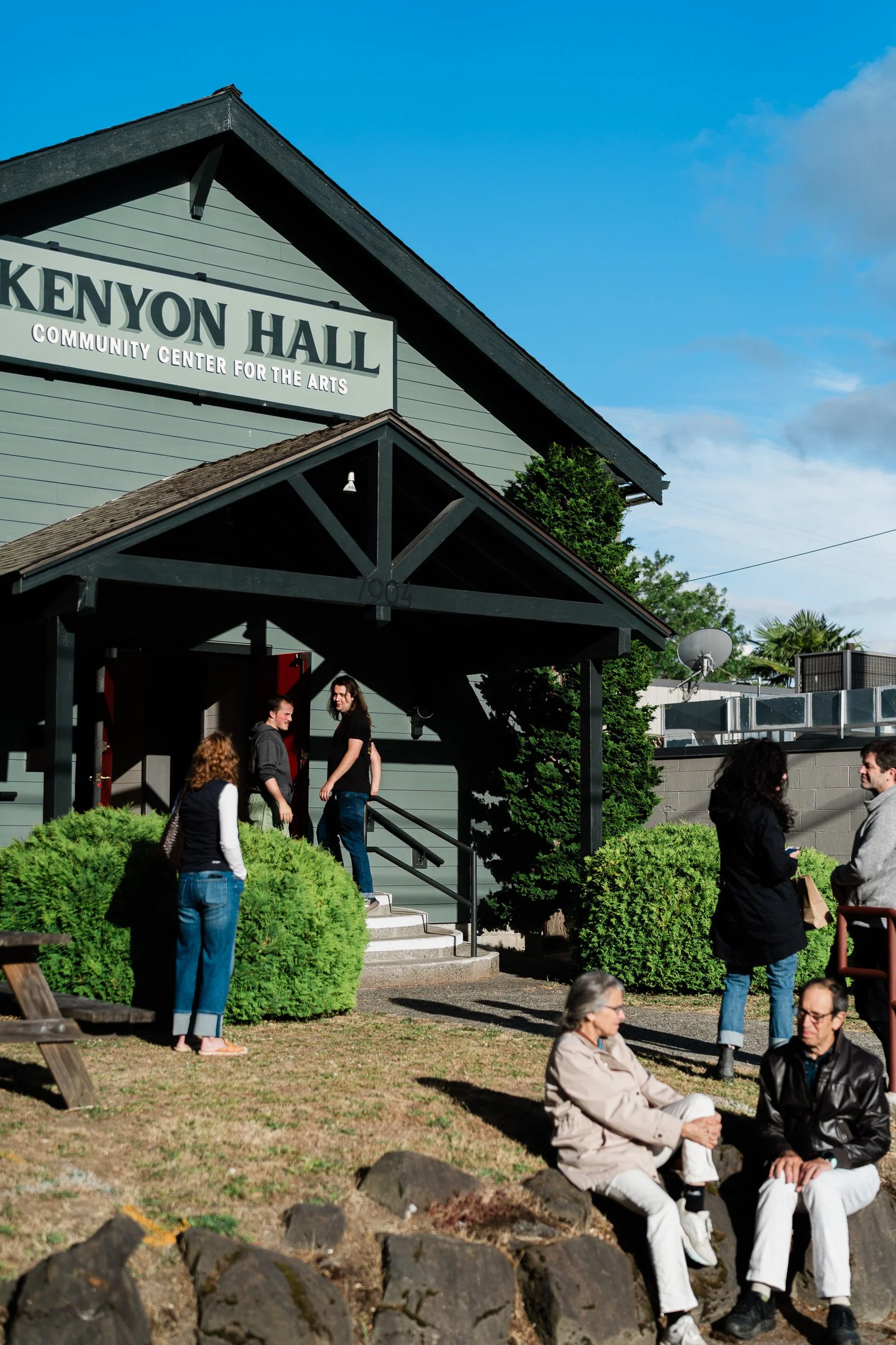 Audience members on Kenyon Hall's lawn