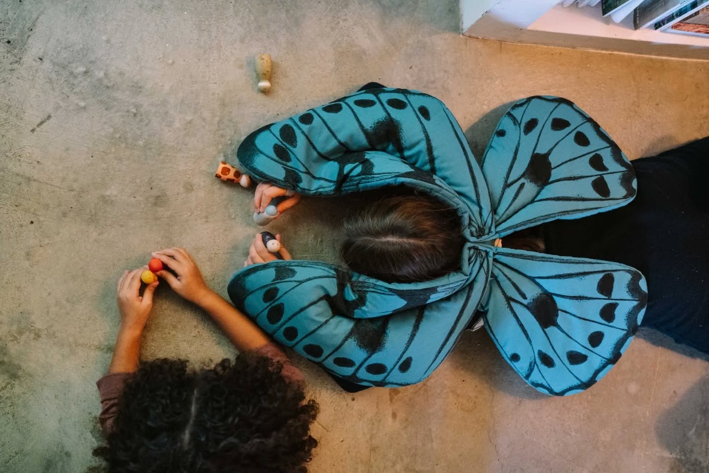 When objects that honour childhood meet,
something quiet and meaningful happens.

Our wings and masks alongside the timeless wooden worlds of @joguines_grapat &mdash;  a shared language of slow play, imagination, and care.

Pieces designed to be hand