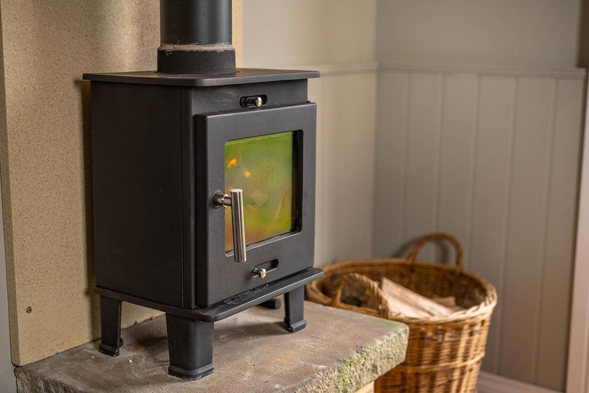 Clayfield Farm shepherd's hut log burner