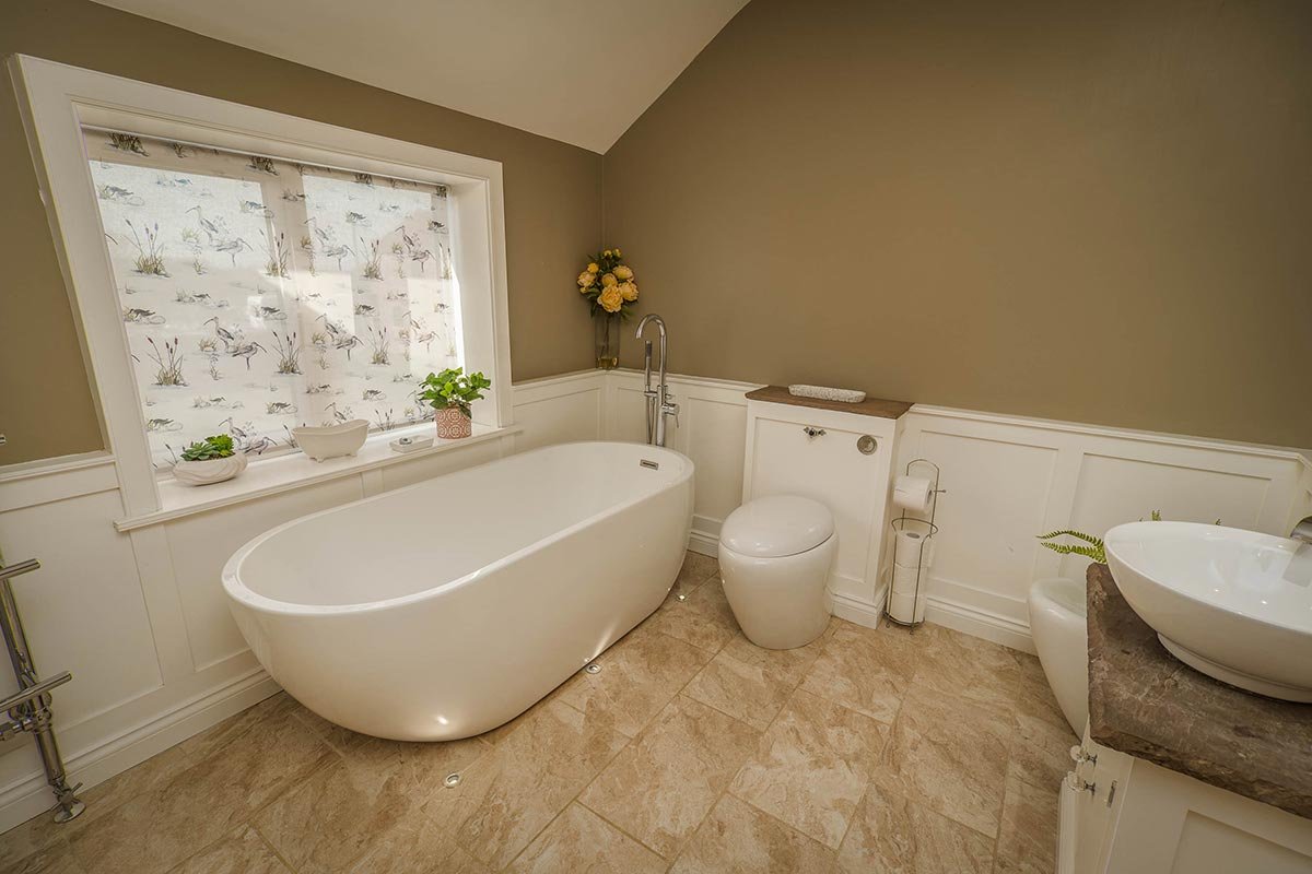 Clayfield Farmhouse bathroom with free-standing bath