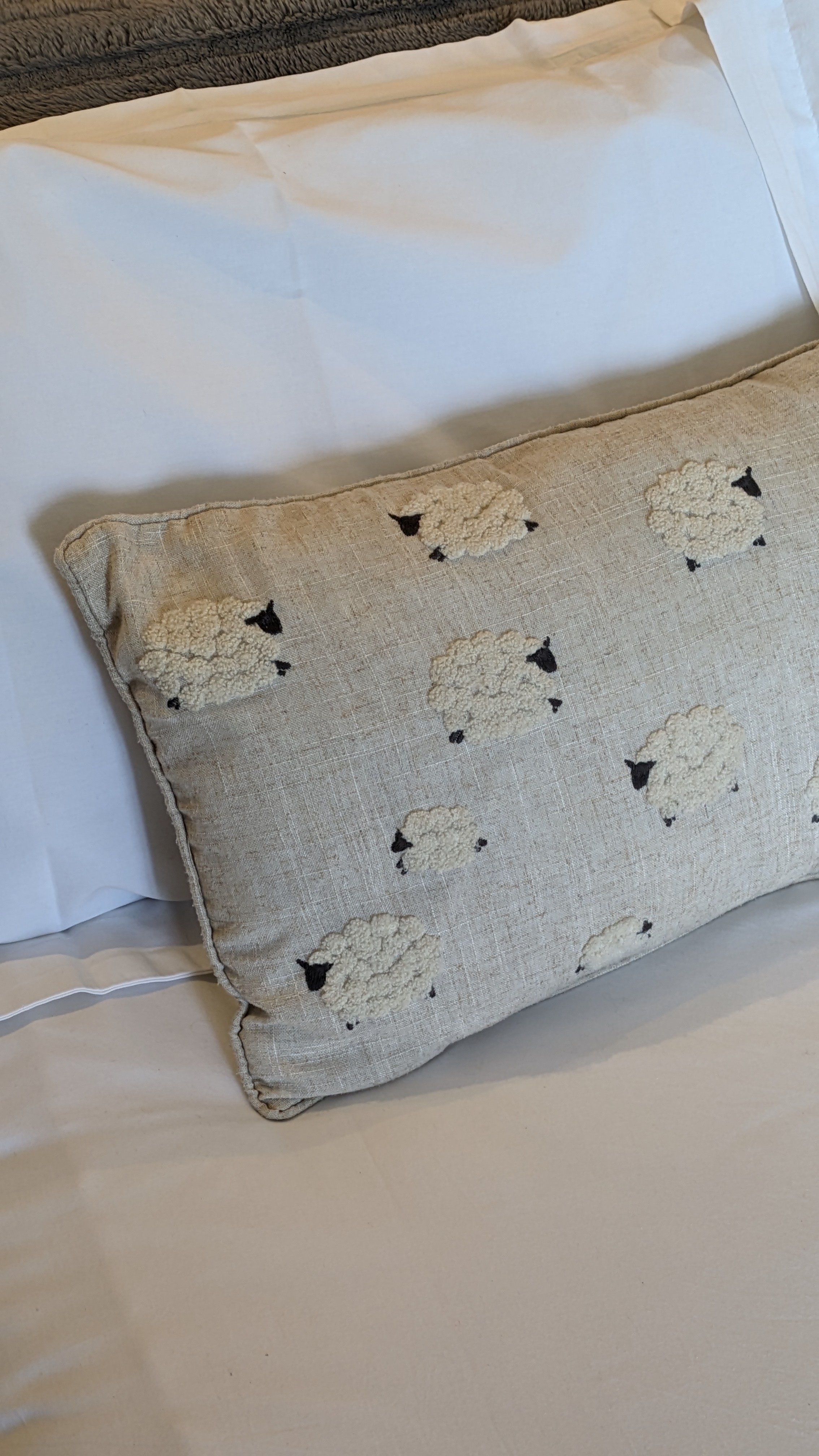 Clayfield Farm shepherd's hut sheep embroidered cushion