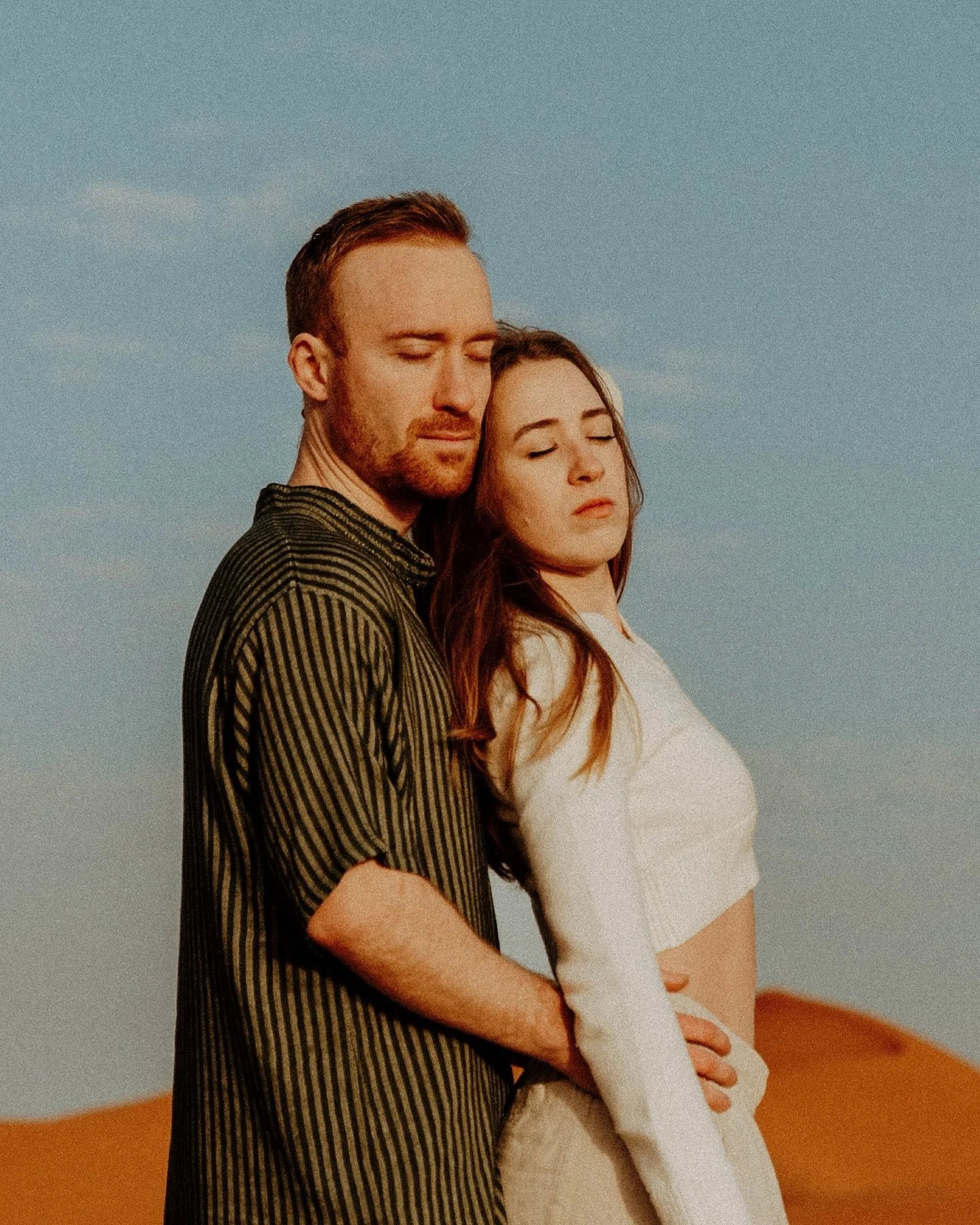 SUNRISE IN MOROCCO 🇲🇦 Probably one of my favorite couples shoots to date. The blue sky&rsquo;s and soft orange sand is simply magical. Trevor +lizzie  #englandphotographer#ukphotographer#traveltheuk#travelengland#europeweddingphotographer#italywedd