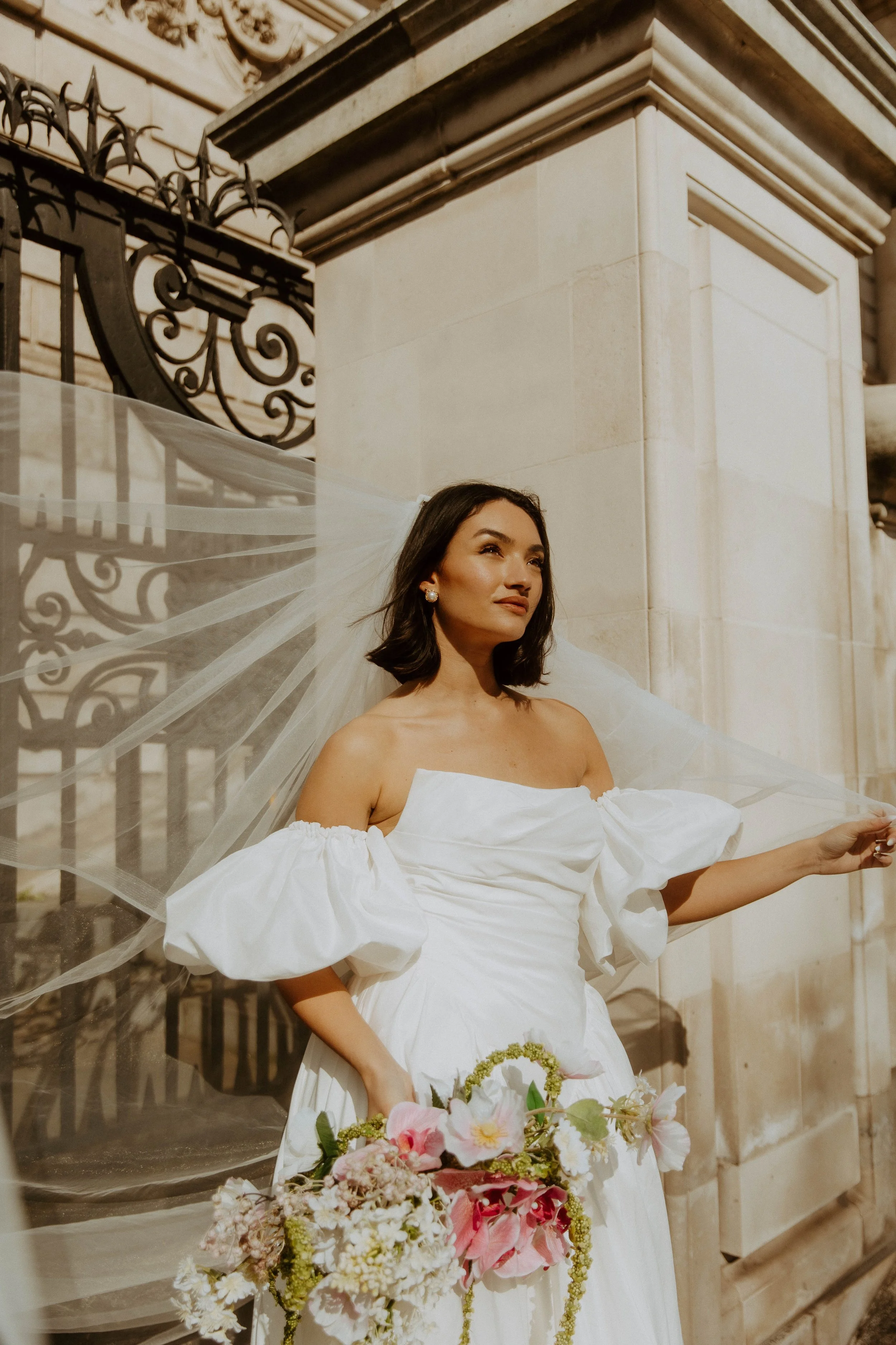  bride in the golden hour glow with white gown on 