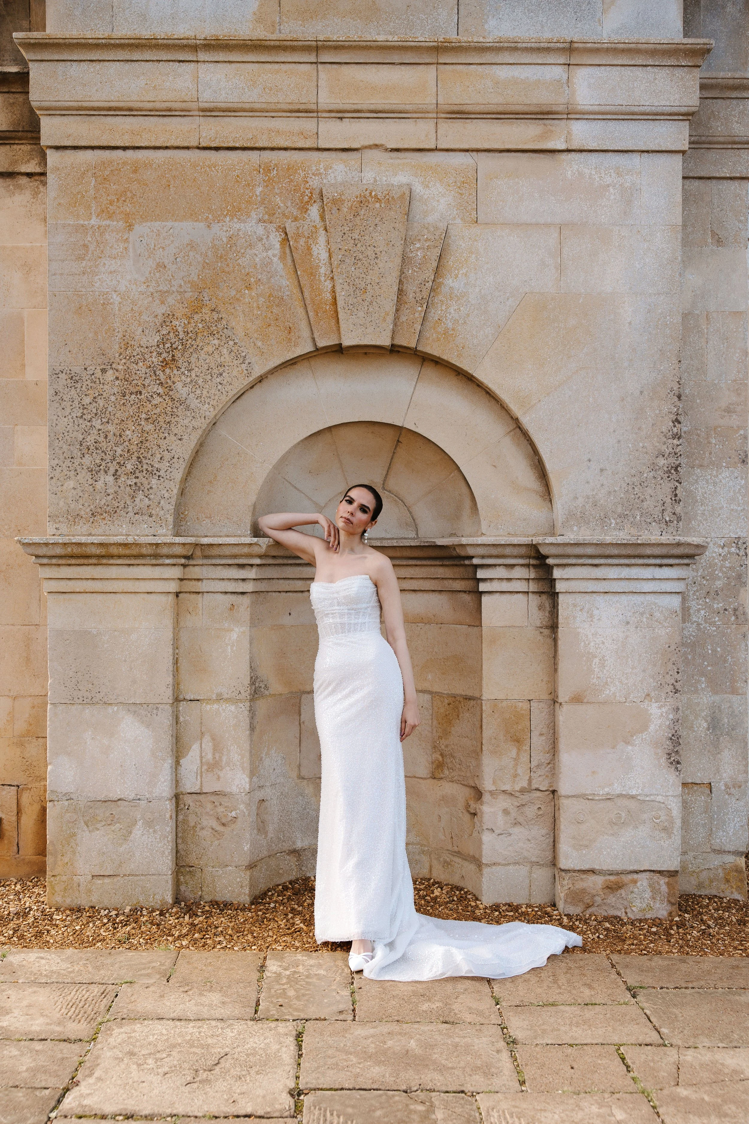 Bride against stone arch