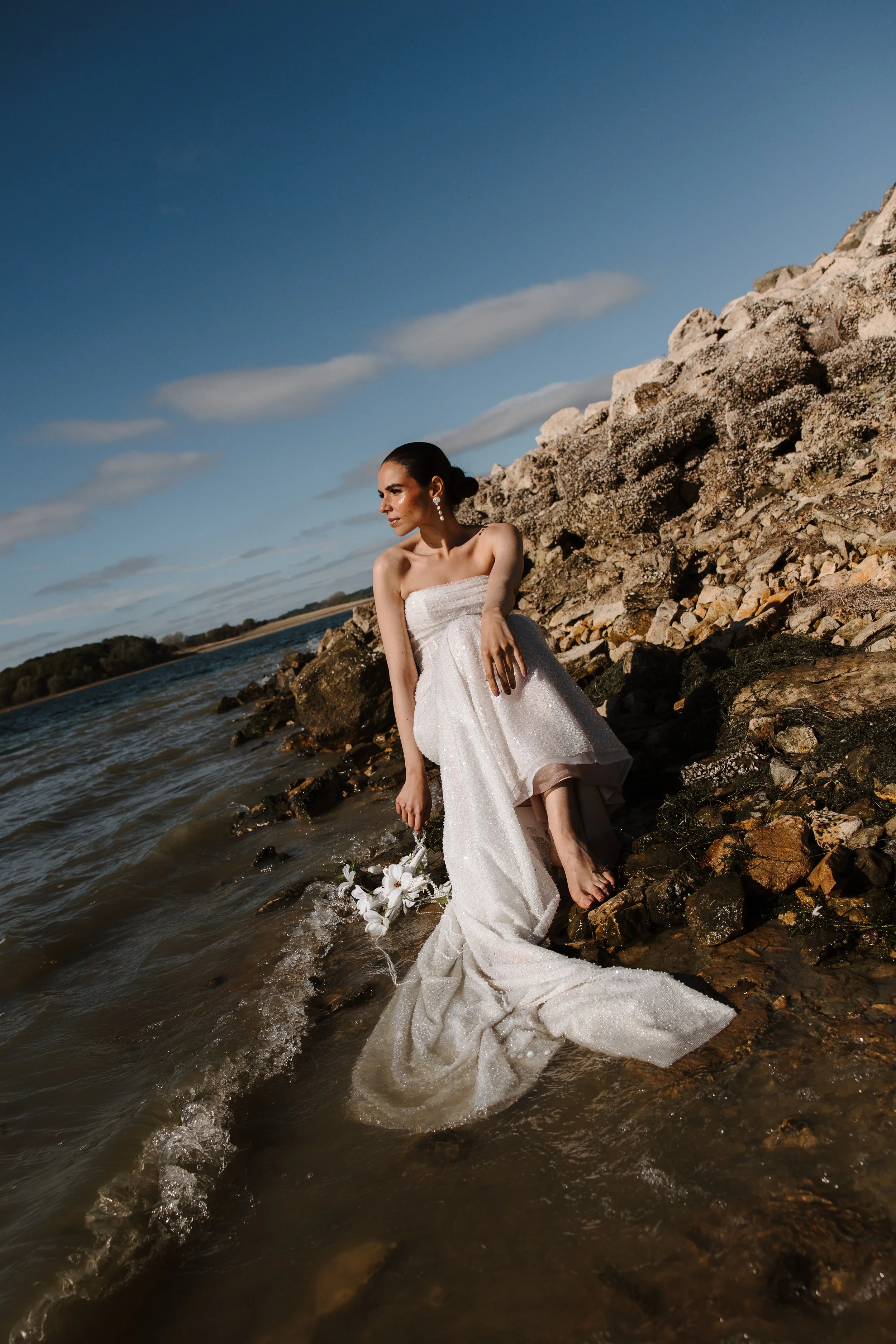 Seated bride in water