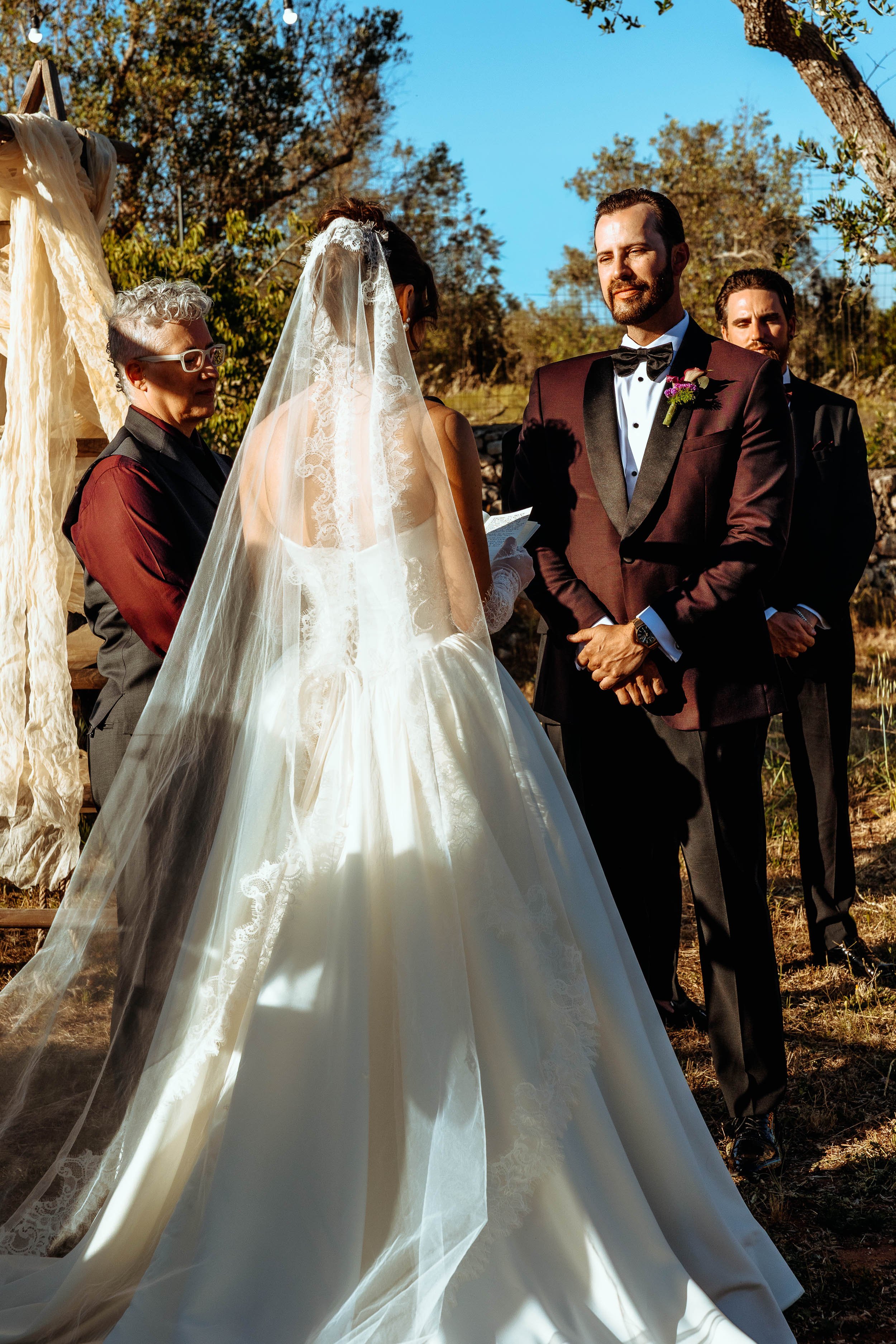 Matt and Rosalinda say 'I Do' under the olive trees at Masseria Quadrelli