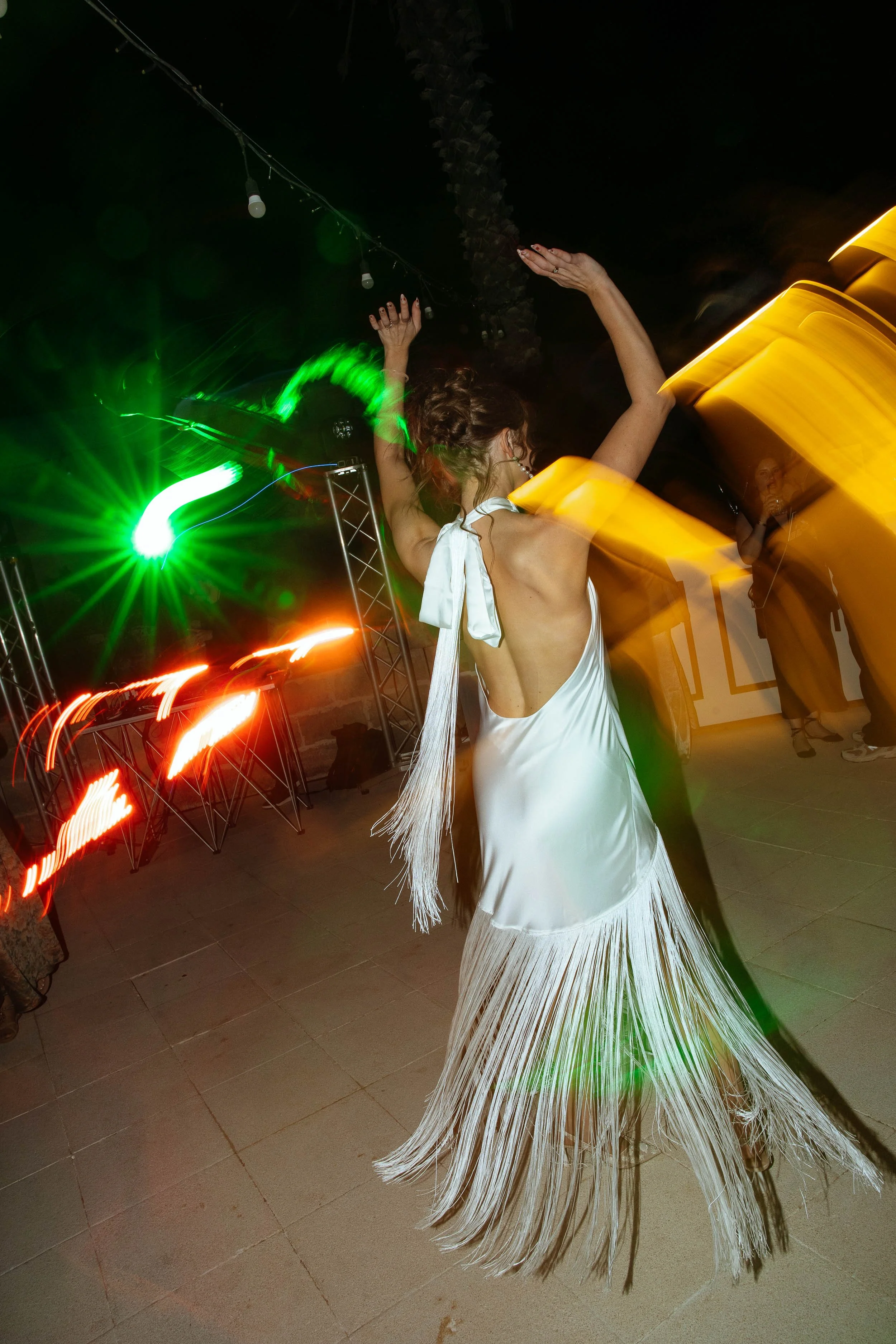 Artful photo of the bride dancing at Masseria Quadrelli