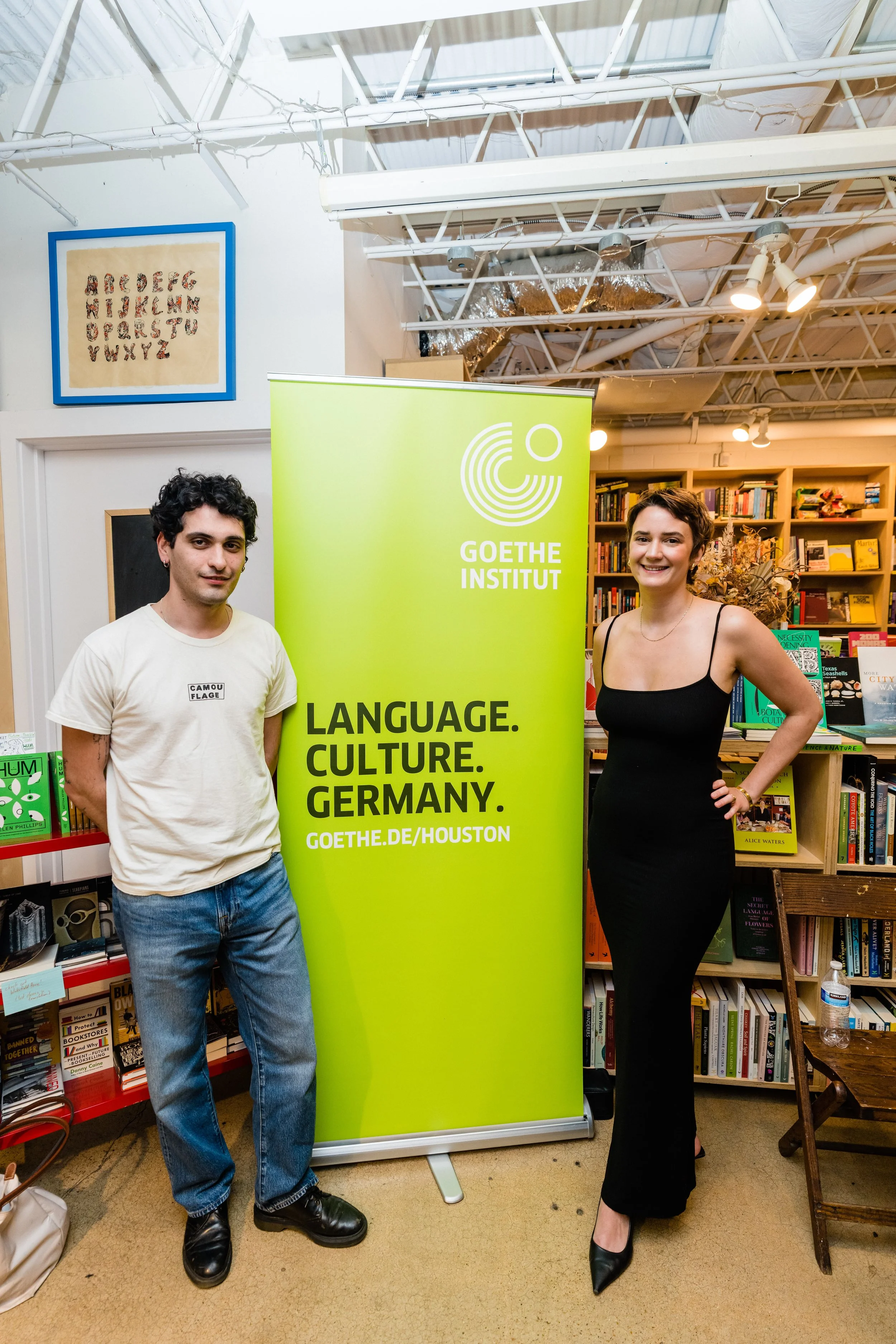German writers Louise Kenn and Mücahit Türk during a reading at Basket Books & Art, Houston