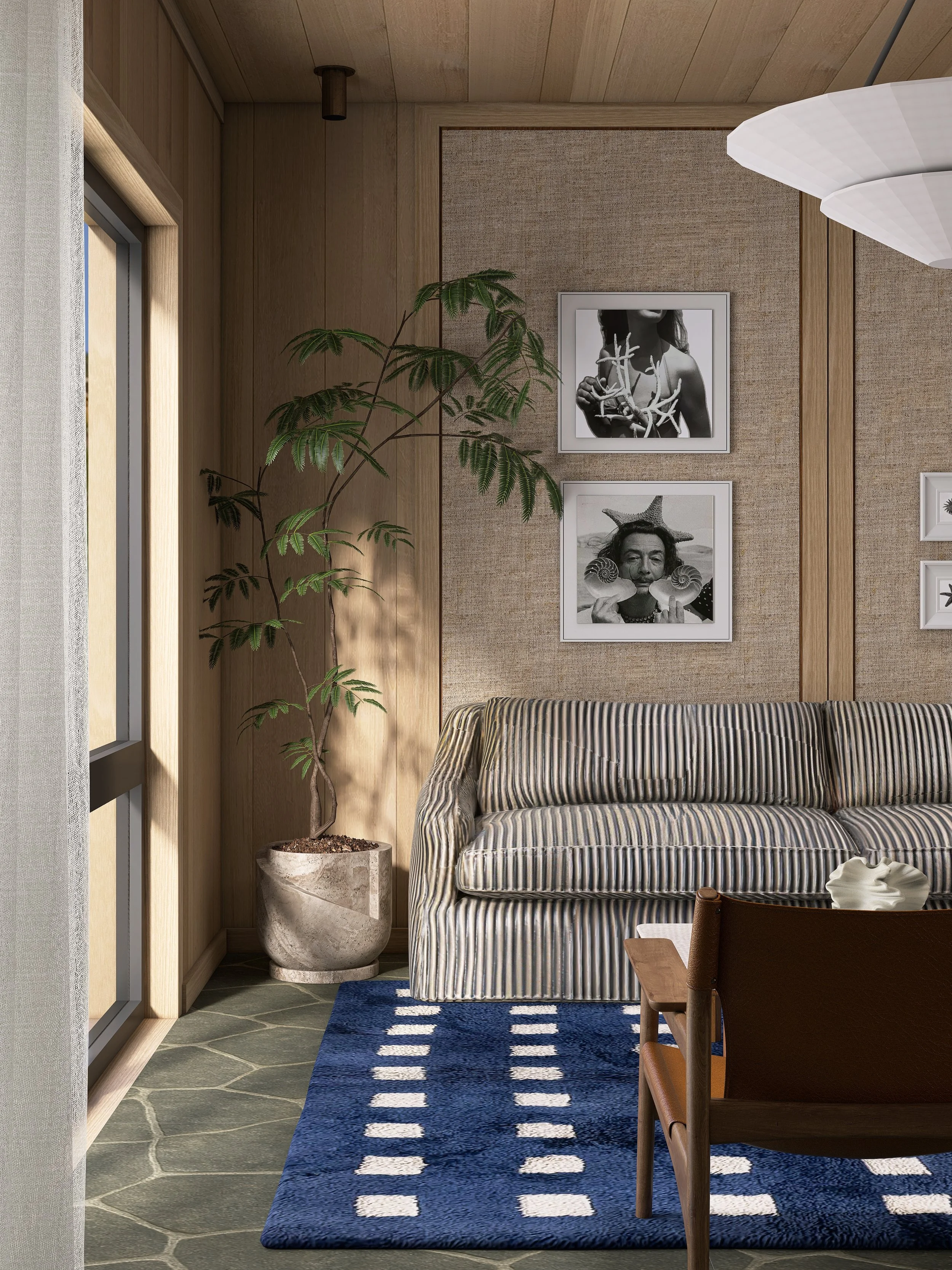Wandkunst-Ecke mit Fotografien, Sofa