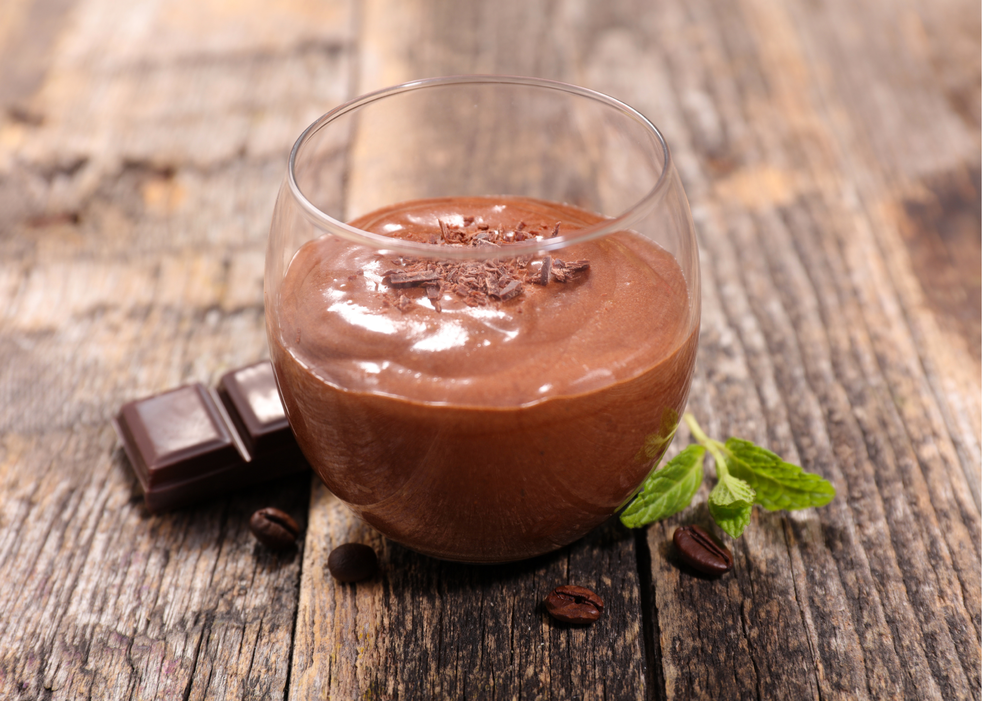 Sweet potato mousse in a glass on a wooden table