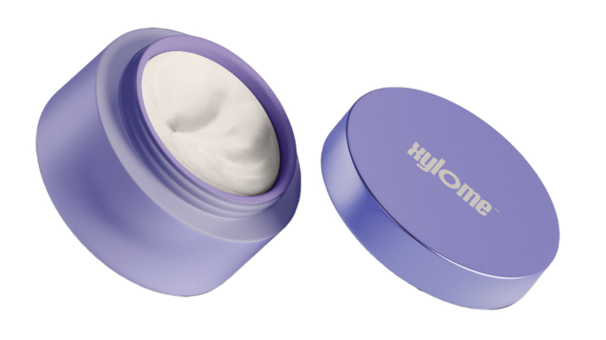 A purple container with a removable lid, labeled 'Xylome', opened to reveal white cream or balm inside.