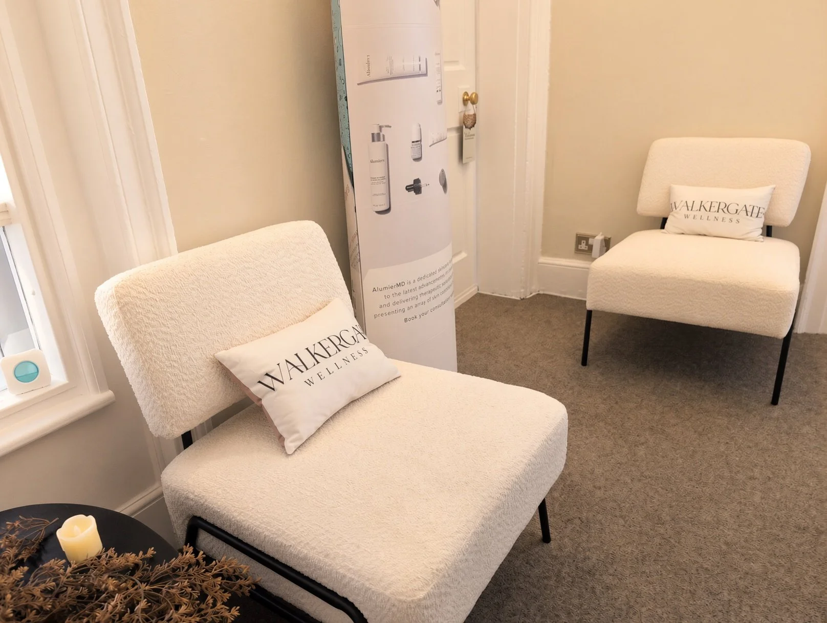 Walkergate Wellness reception area at Walkergate House in Beverley, with two white chairs for clients.
