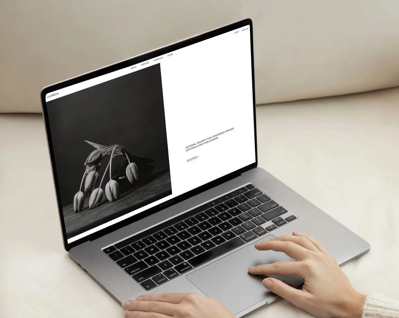 The Lucera Squarespace template displayed on a laptop screen.