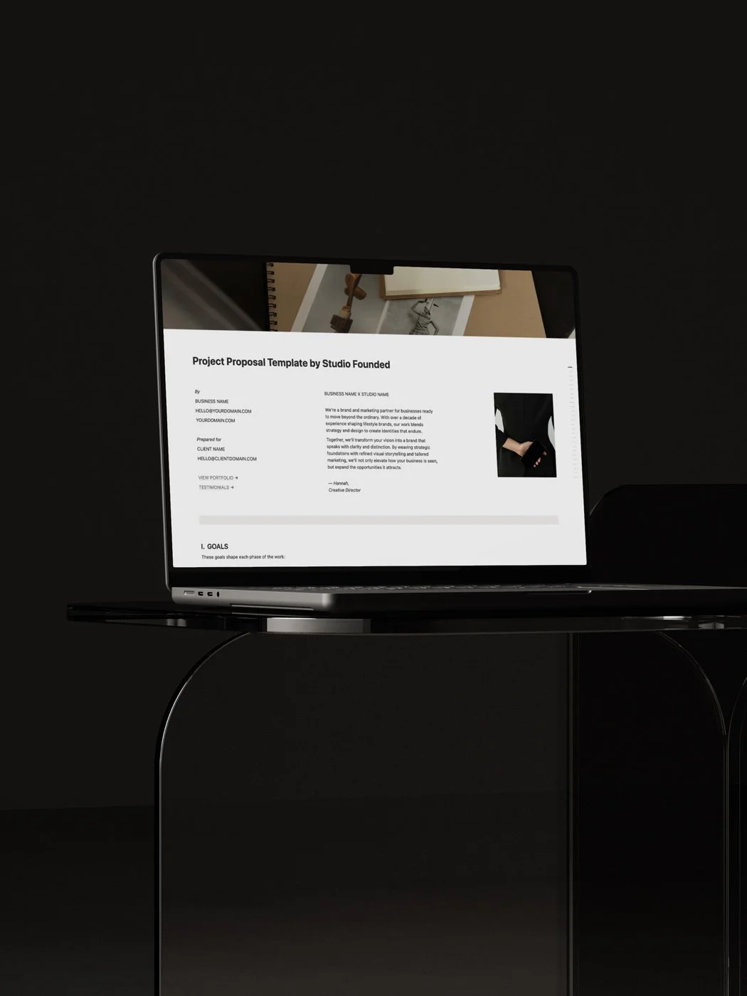 The Notion Project Proposal Template displayed a laptop screen.