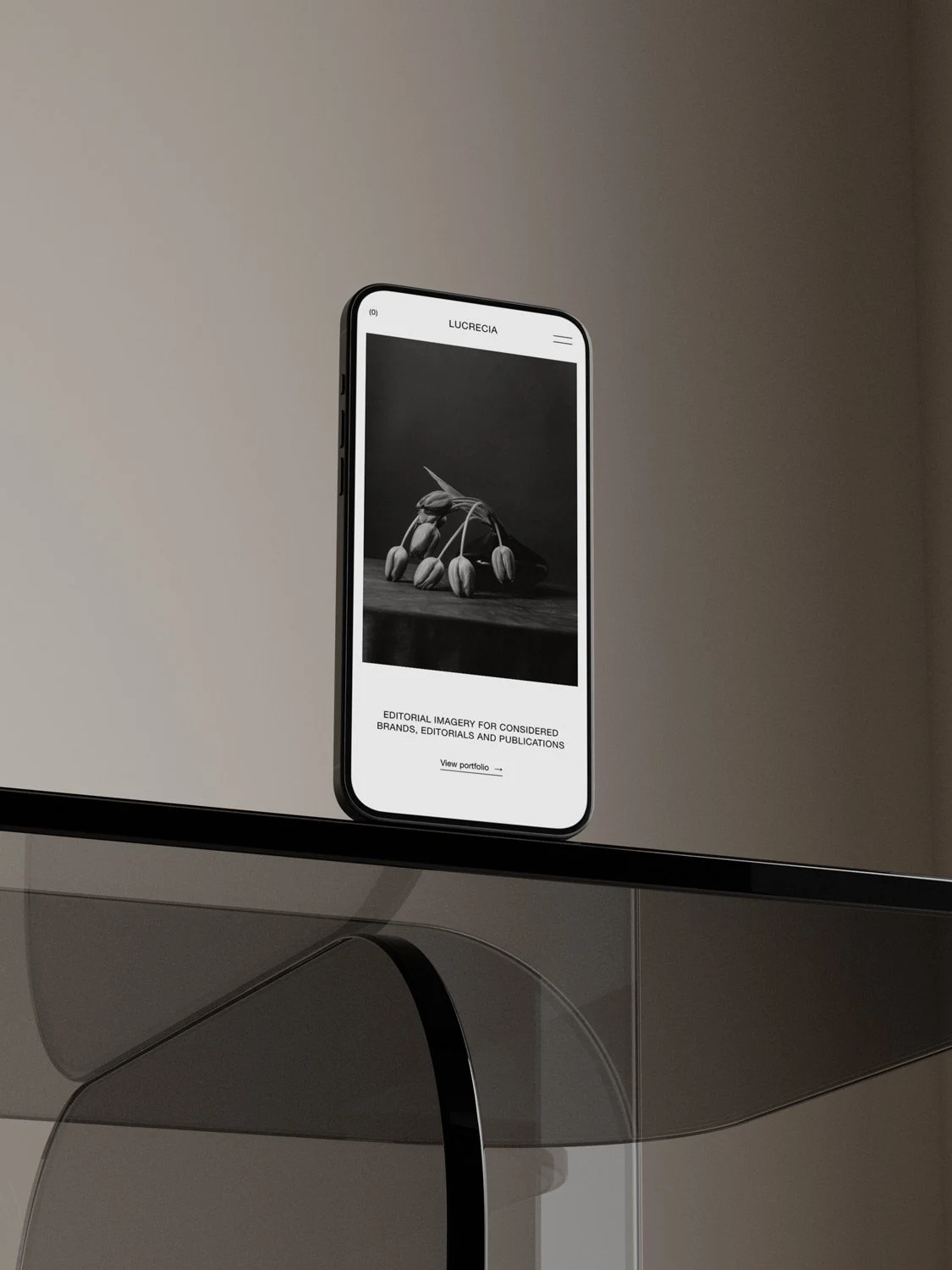 The Lucrecia Squarespace photography template displayed on a mobile phone screen.