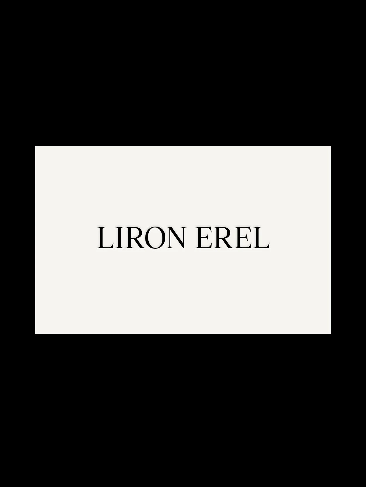 A black and white photo of a couple with overlayed text that says "Liron Erel."