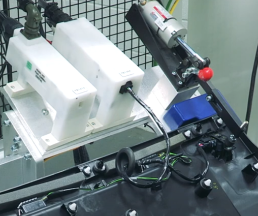 Industrial machine with white components and cables