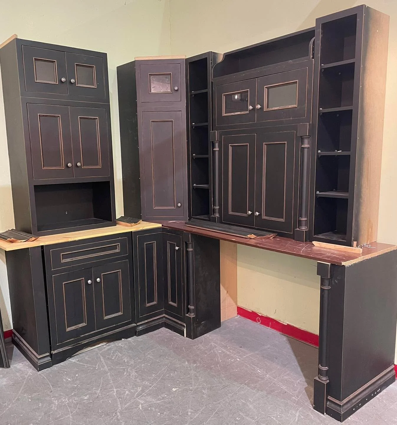 Black cabinet set $750 - has a sink base, would make a great bar or airbnb kitchen