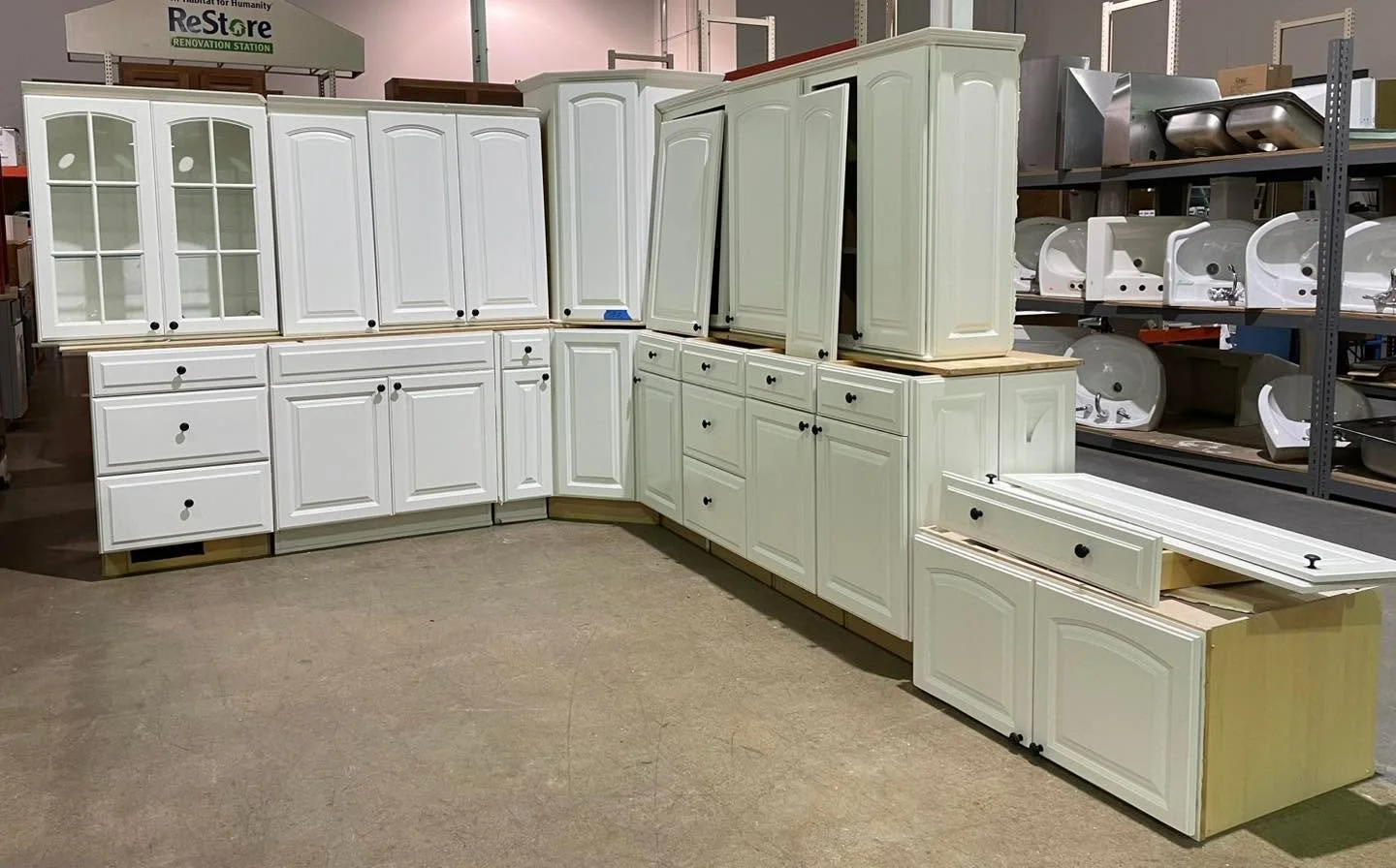 White kitchen cabinet set $1500 - Thomasville brand, about 18&rsquo; of base cabinets. Not sold separately.