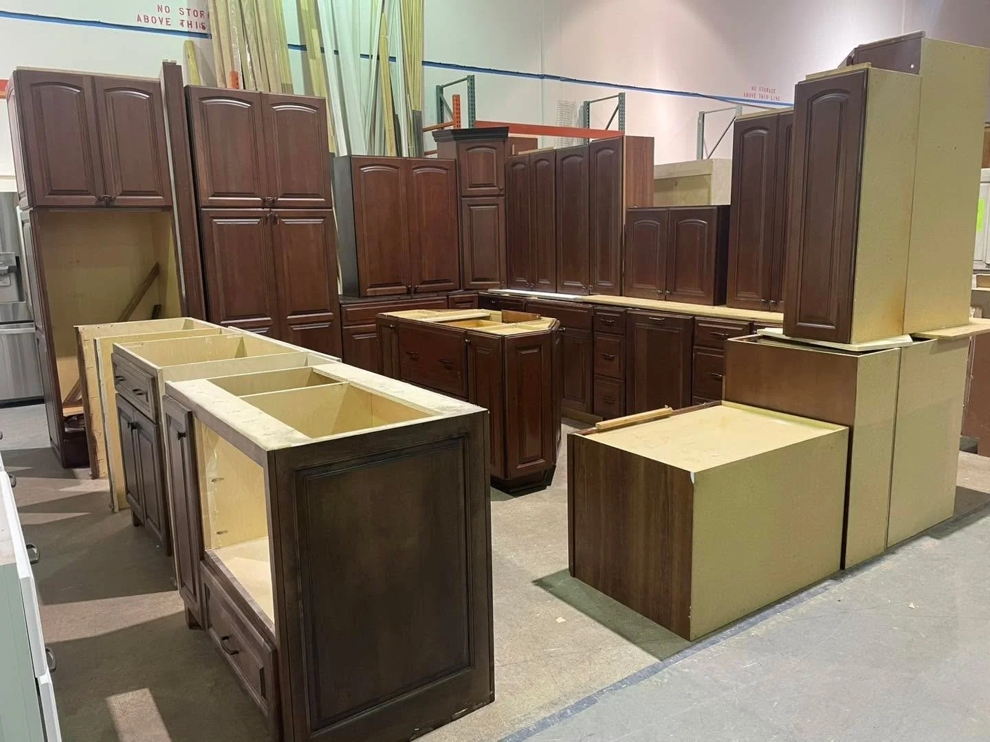 Kitchen cabinet set $1850 - about 28&rsquo; of base cabinets (island in foreground is part of another set, island in background is included), not sold separately