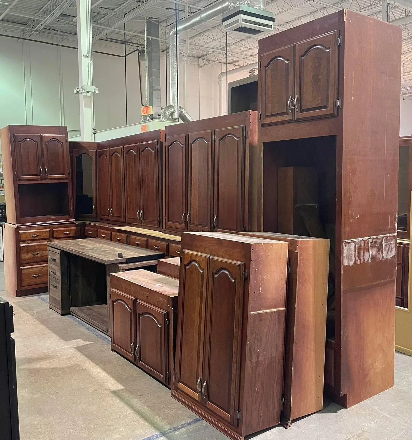 Kitchen cabinet set $1500 - about 18&rsquo; of base cabinets. Not sold separately. (Desk not included)