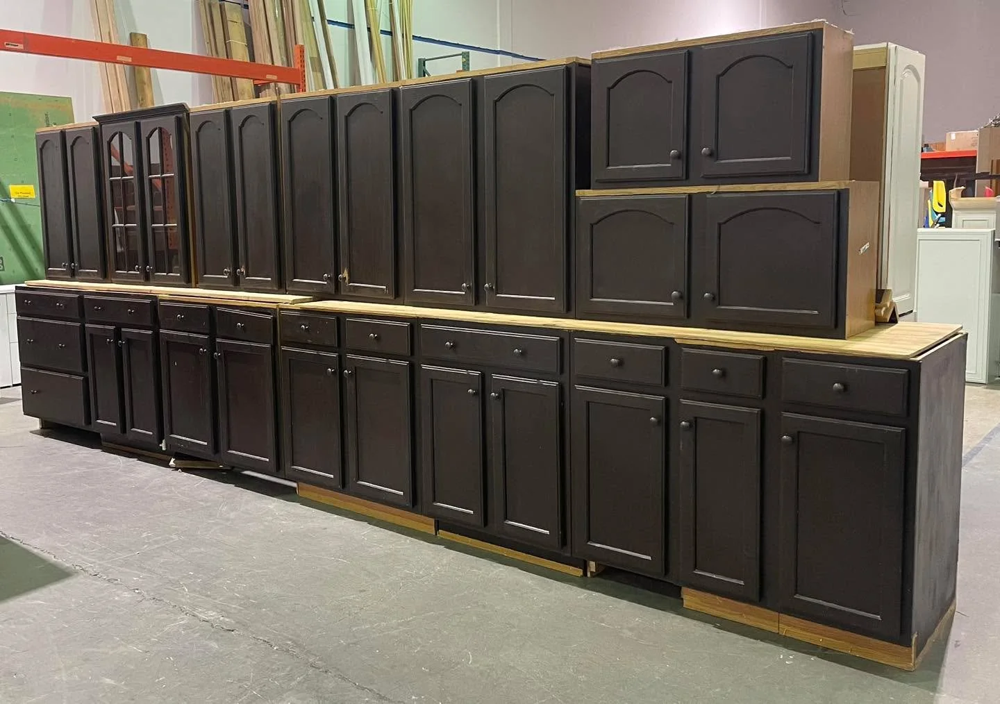 Kitchen cabinet set $950 - painted brown, about 16&rsquo; of base cabinets.