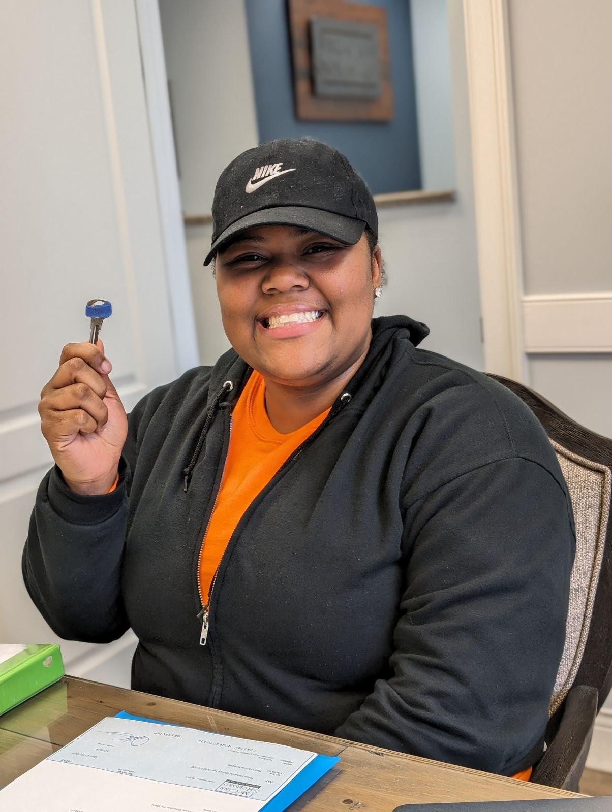 Habitat for Humanity Williamson-Maury homeowner holding the keys to their new home.