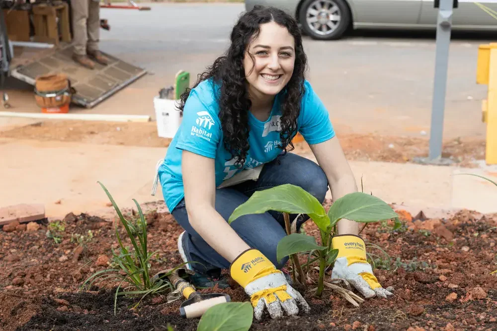 Volunteer Woman Tending to Garden