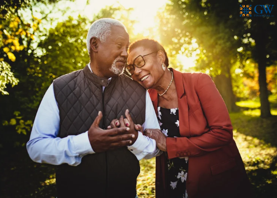 Older couple holding hands and walking