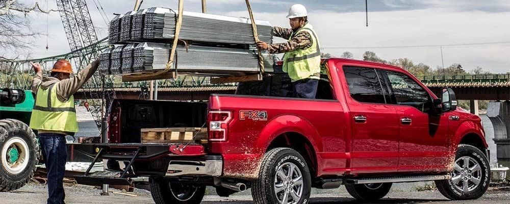 Machine-Loading-Heavy-Objects-in-Bed-of-2019-Ford-F-150.jpg