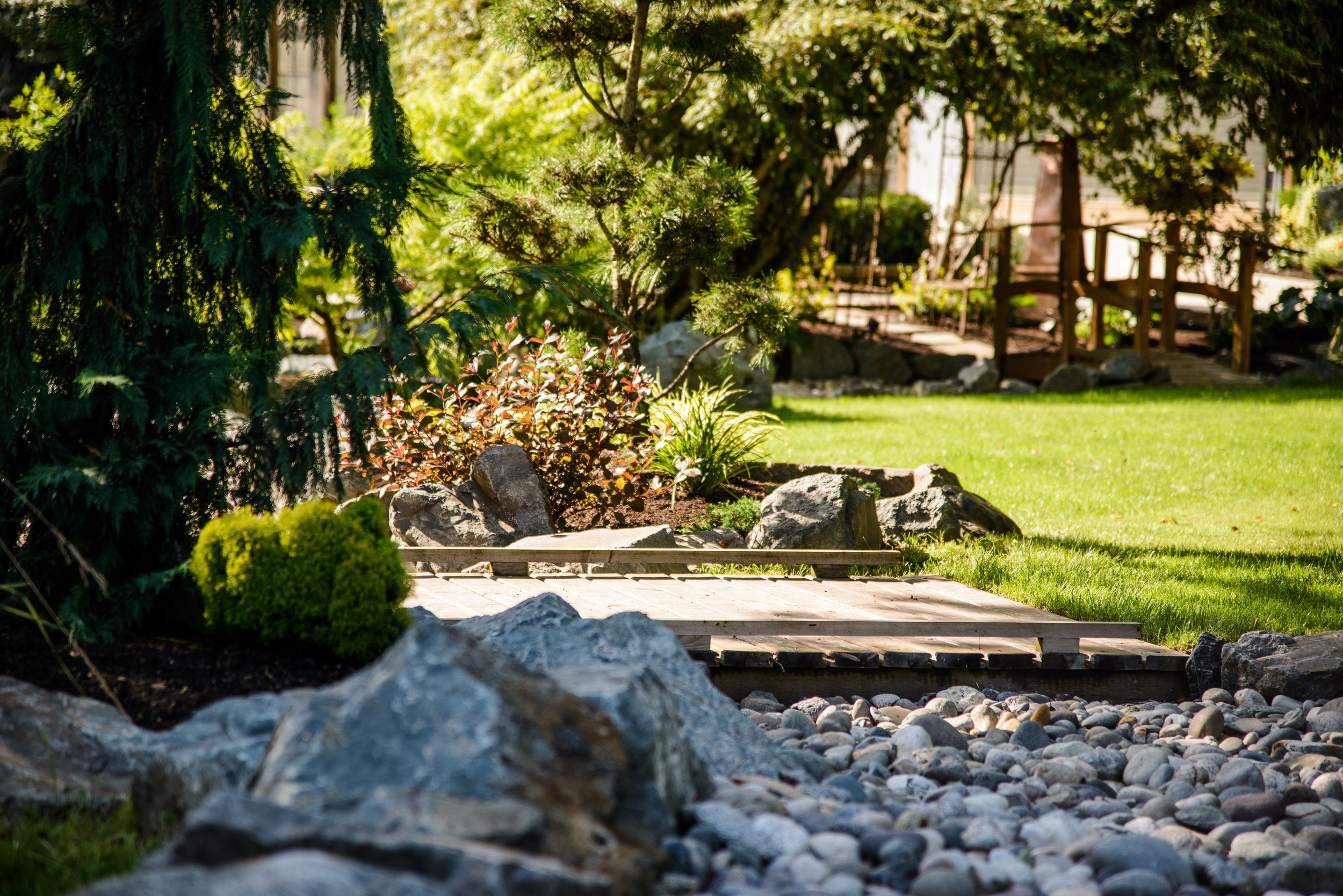 ROCK GARDENS, NATURAL STONE FEATURES, LANDSCAPE LIGHTING, AND WATER FEATURES