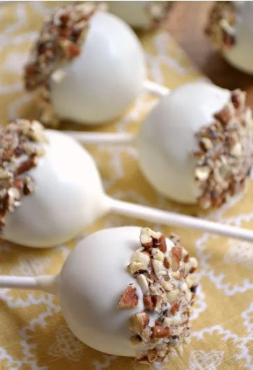 Spiced Rum Cake pops with White chocolate and pecan crumble.jpg