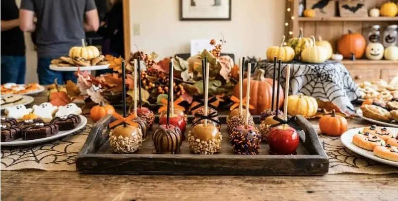Halloween Dessert Table Variety of Caramel Apples.jpg