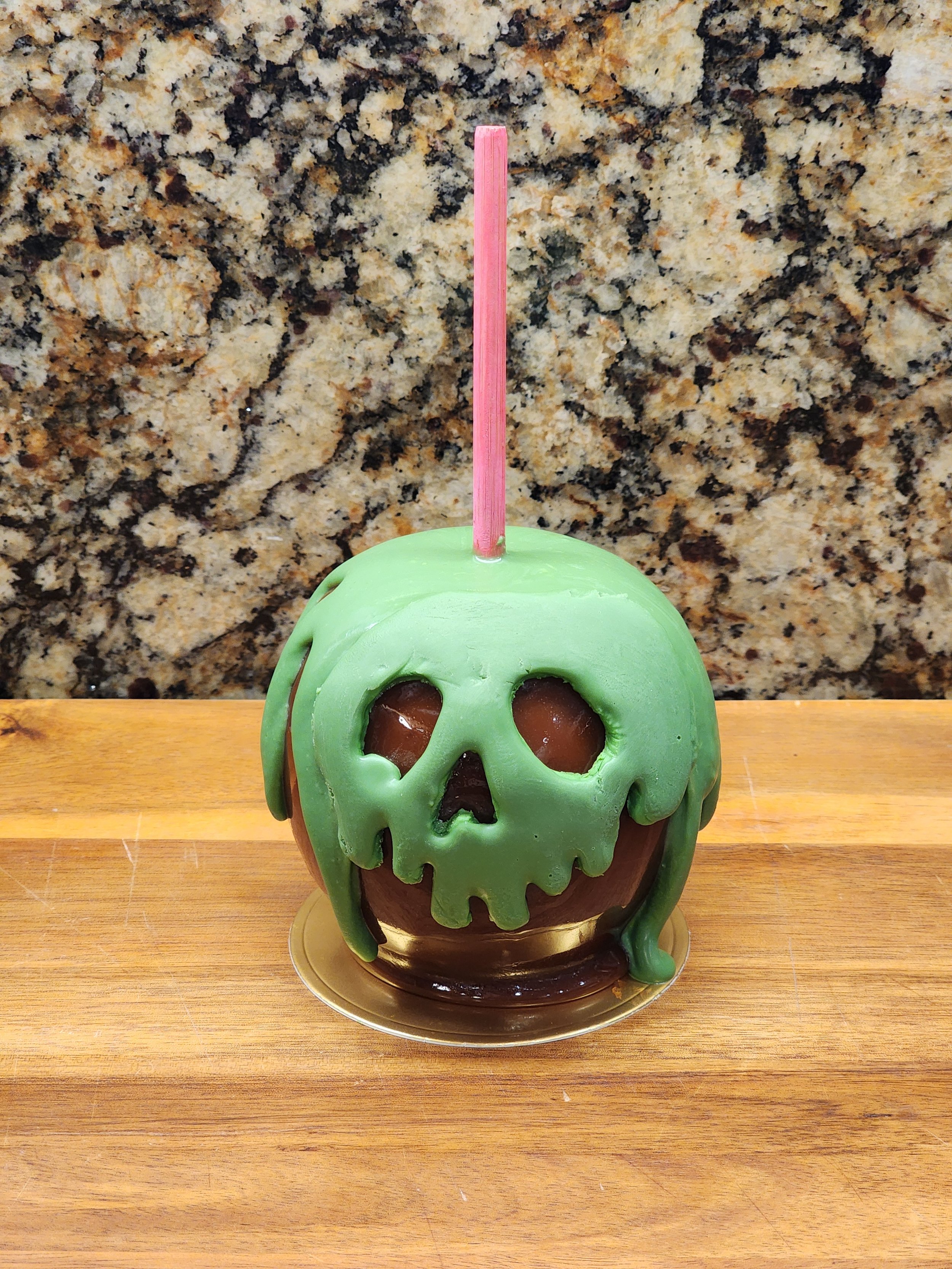 Dripping green poison apple from Snow White caramel apple.jpg