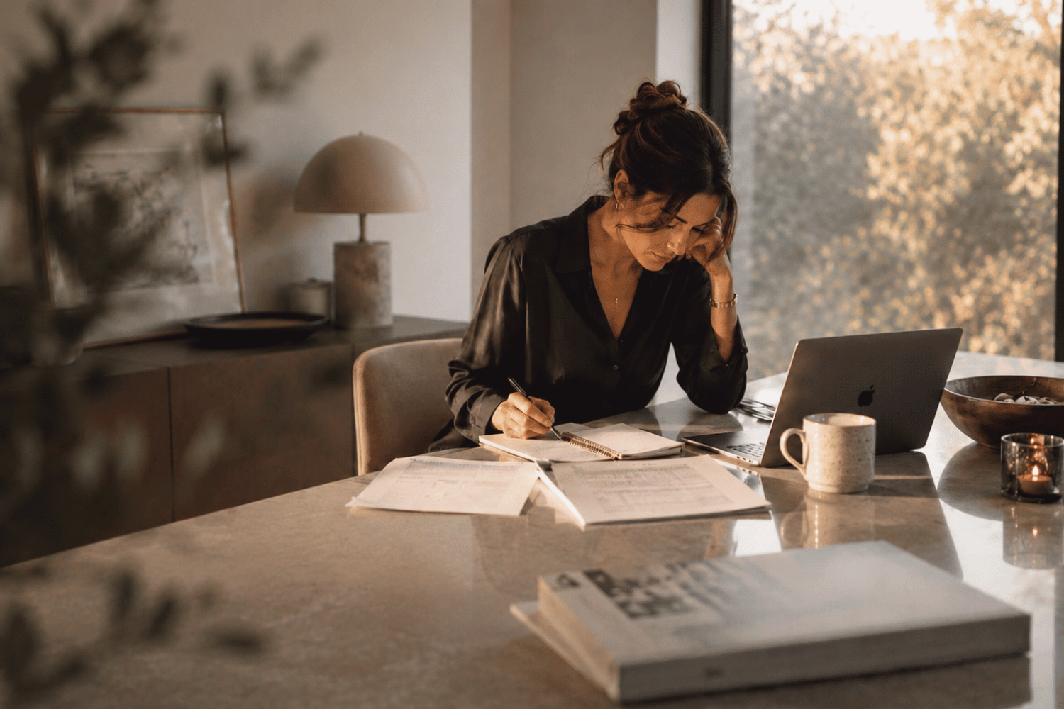 A professional woman in a modern office, representing career growth and employer equity compensation planning.