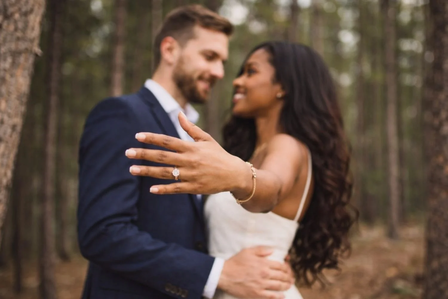 Engaged couple outdoors, considering a prenuptial agreement