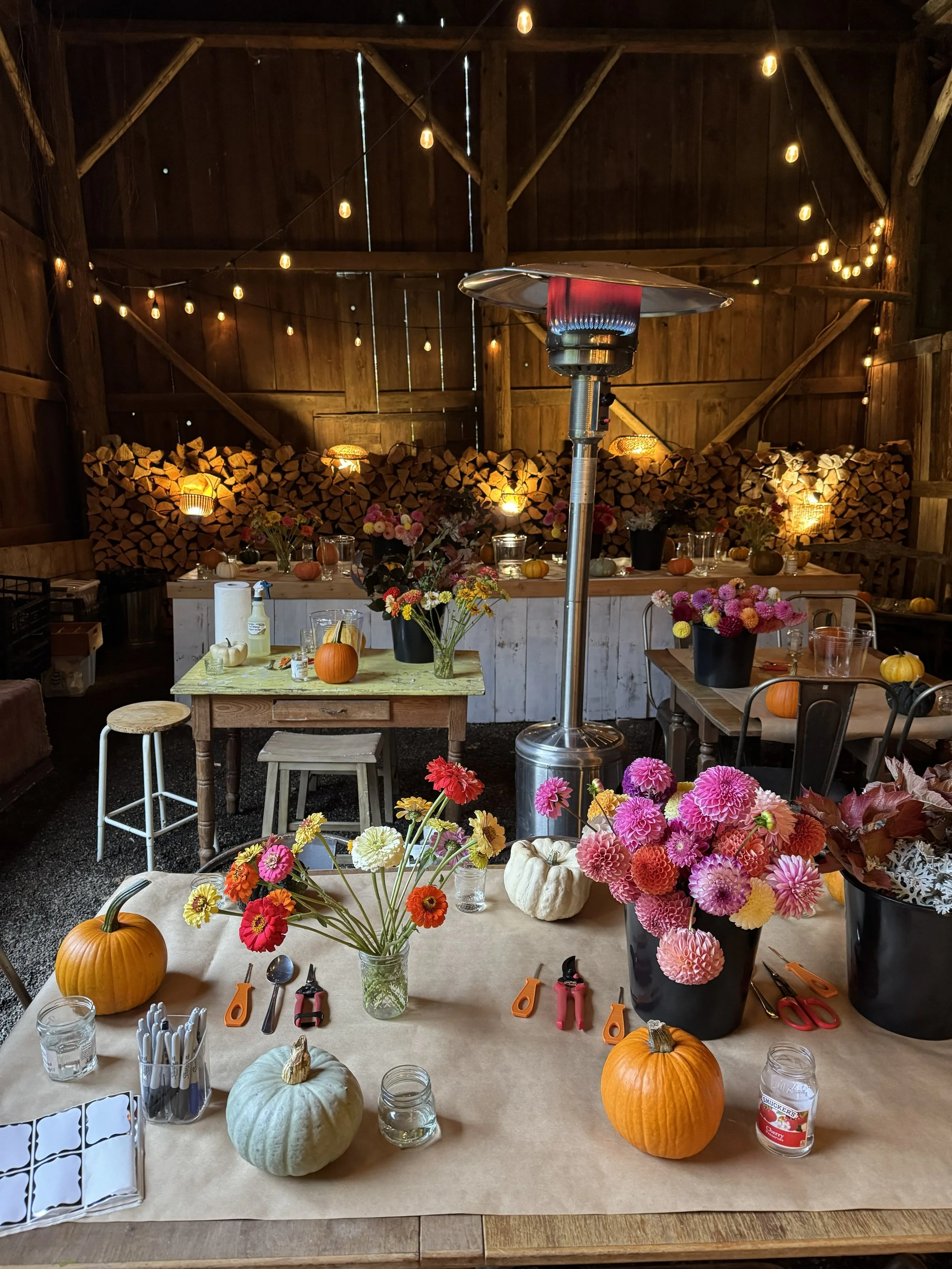 pure bliss bouquet bar with pumpkins in barn set up.jpg