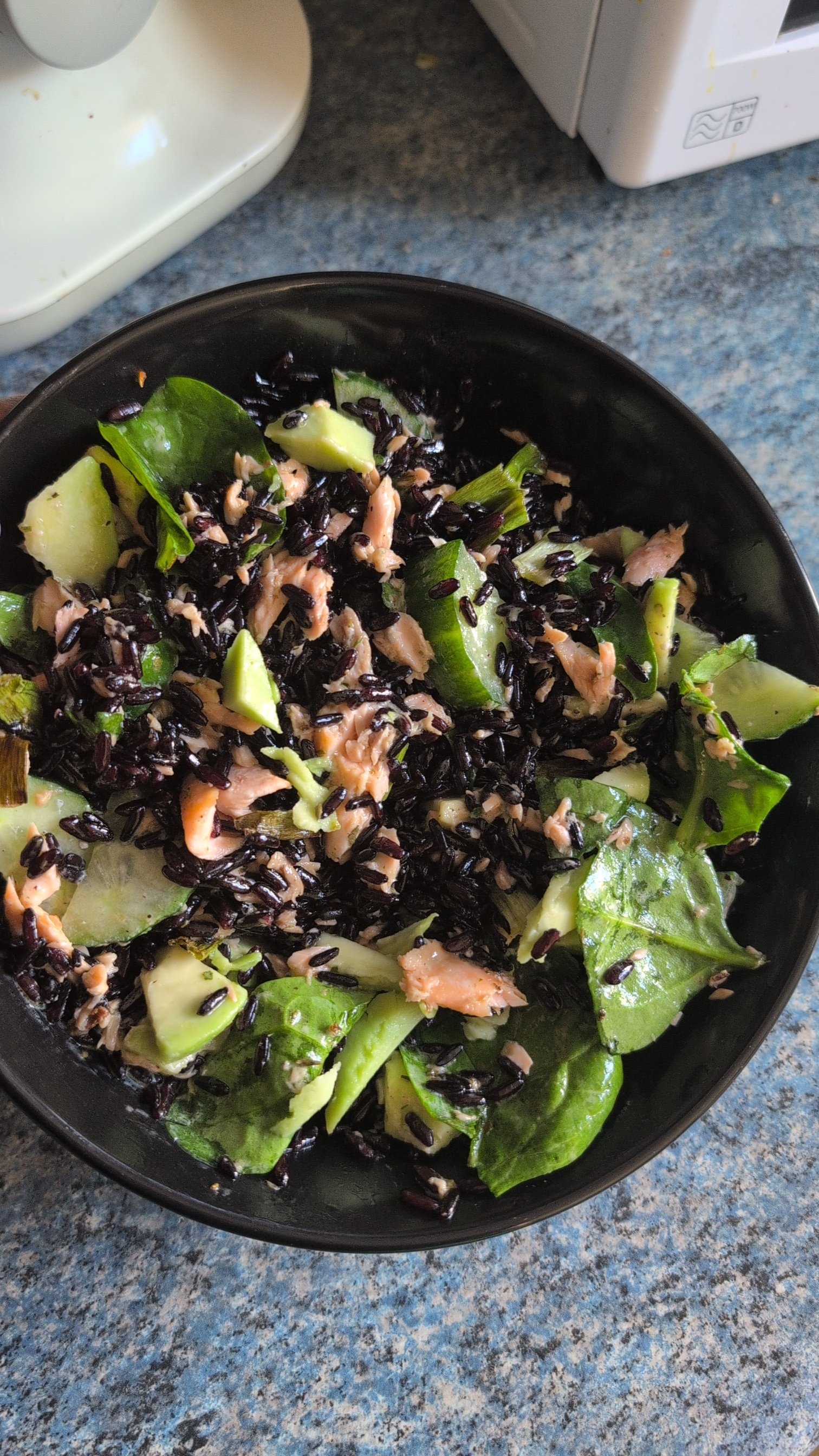 Crispy black rice salmon spinach avocado cucumber salad 