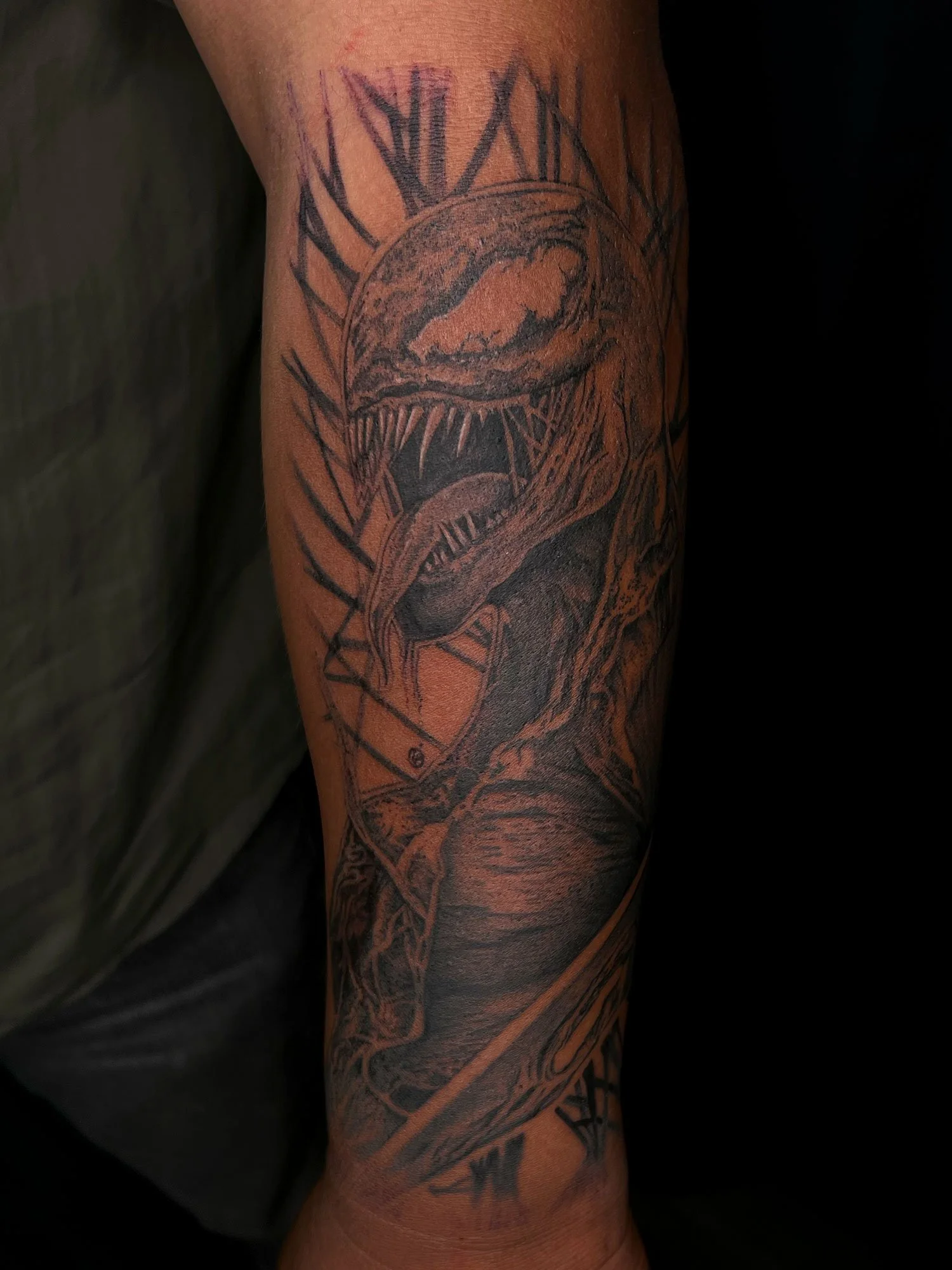 elizagreed-san-diego-black-grey-realism-venom-carnage-tattoo.jpg