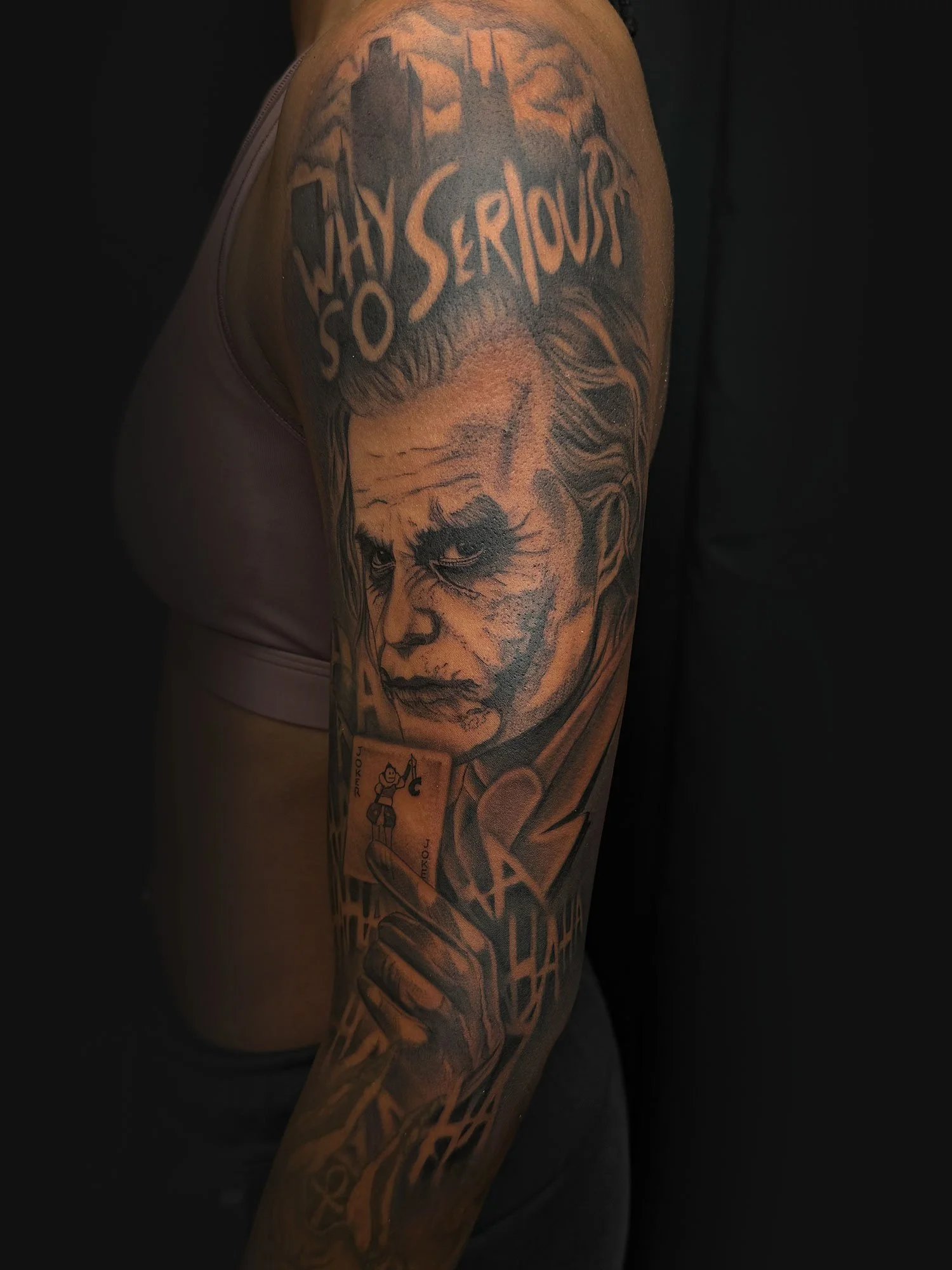 elizagreed-san-diego-black-grey-realism-joker-batman-why-so-serious-tattoo.jpg