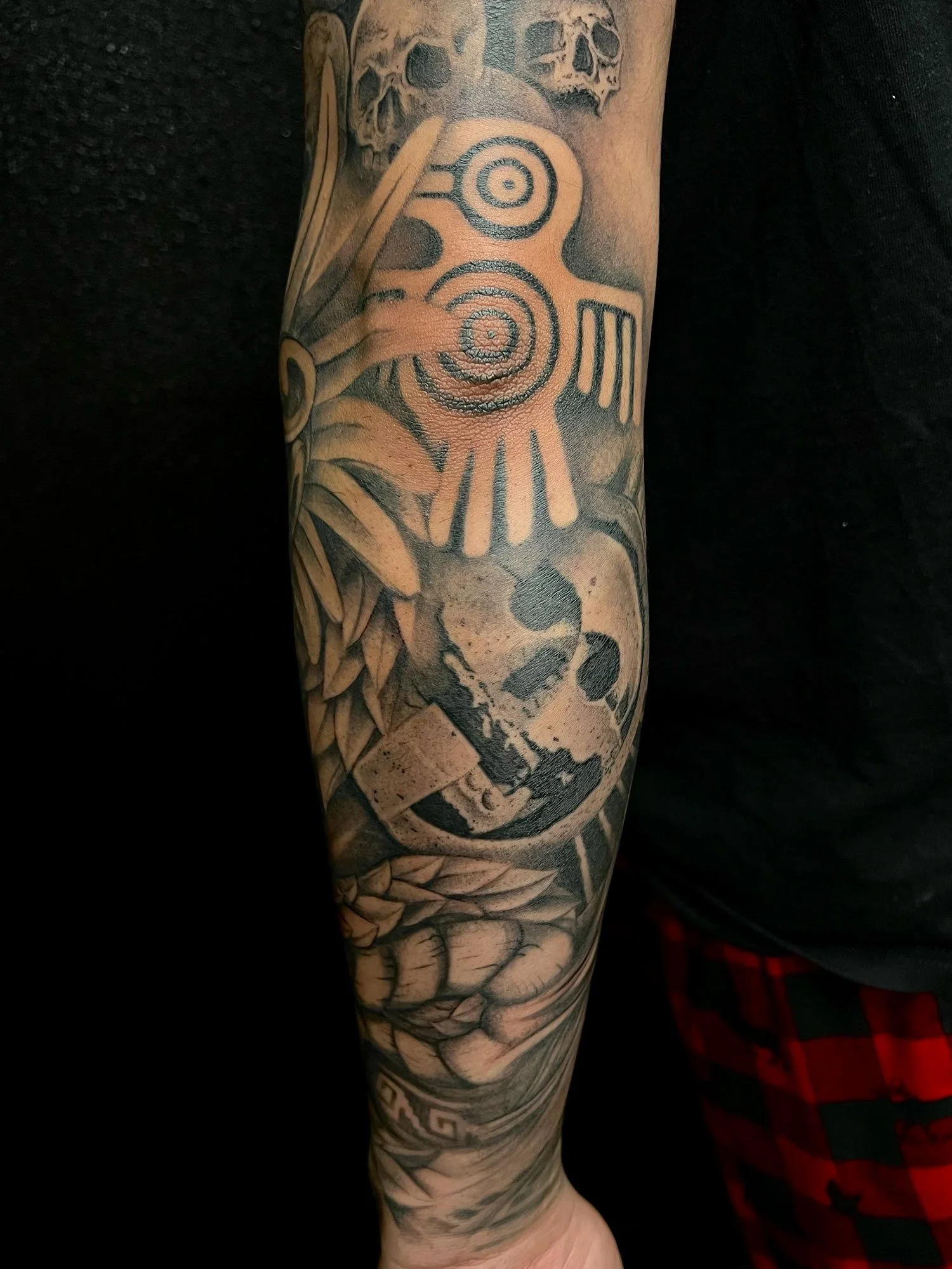 elizagreed-san-diego-black-grey-realism-aztec-sun-god-bird-tattoo.jpg