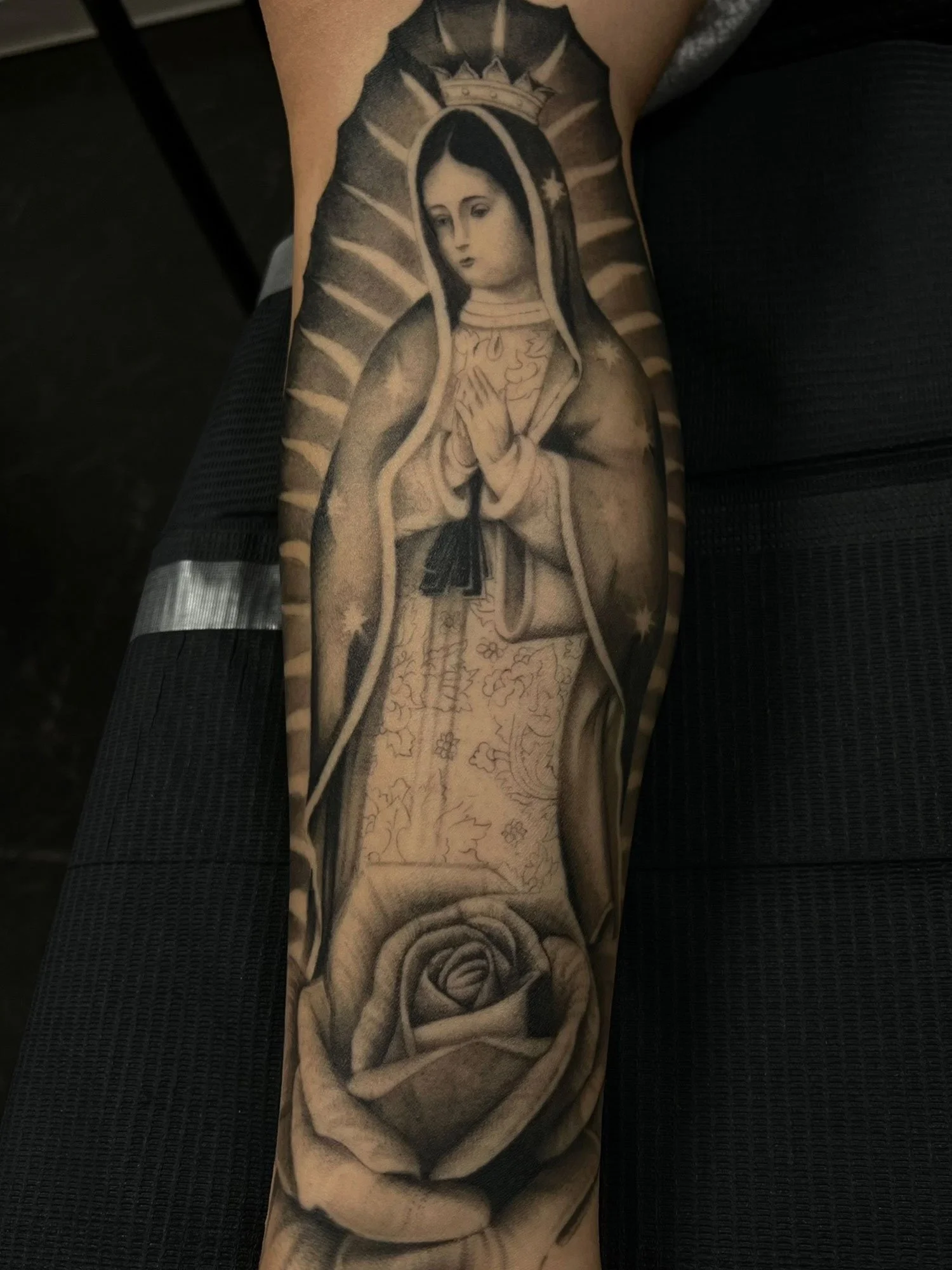 elizagreed-san-diego-black-grey-realism-virgin-mary-tattoo.jpg