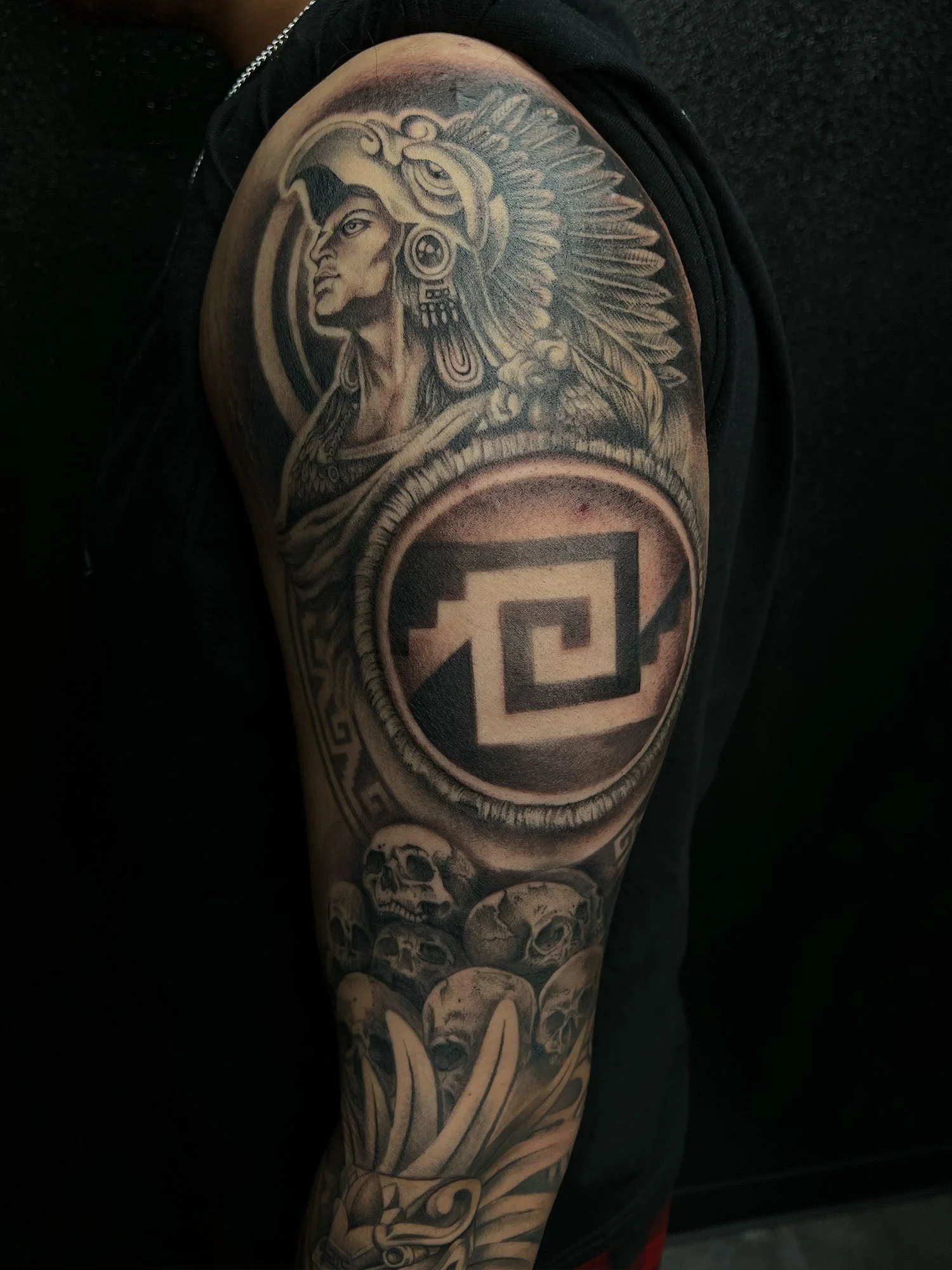 elizagreed-san-diego-black-grey-realism-aztec-sleeve-skulls-tattoo.jpg