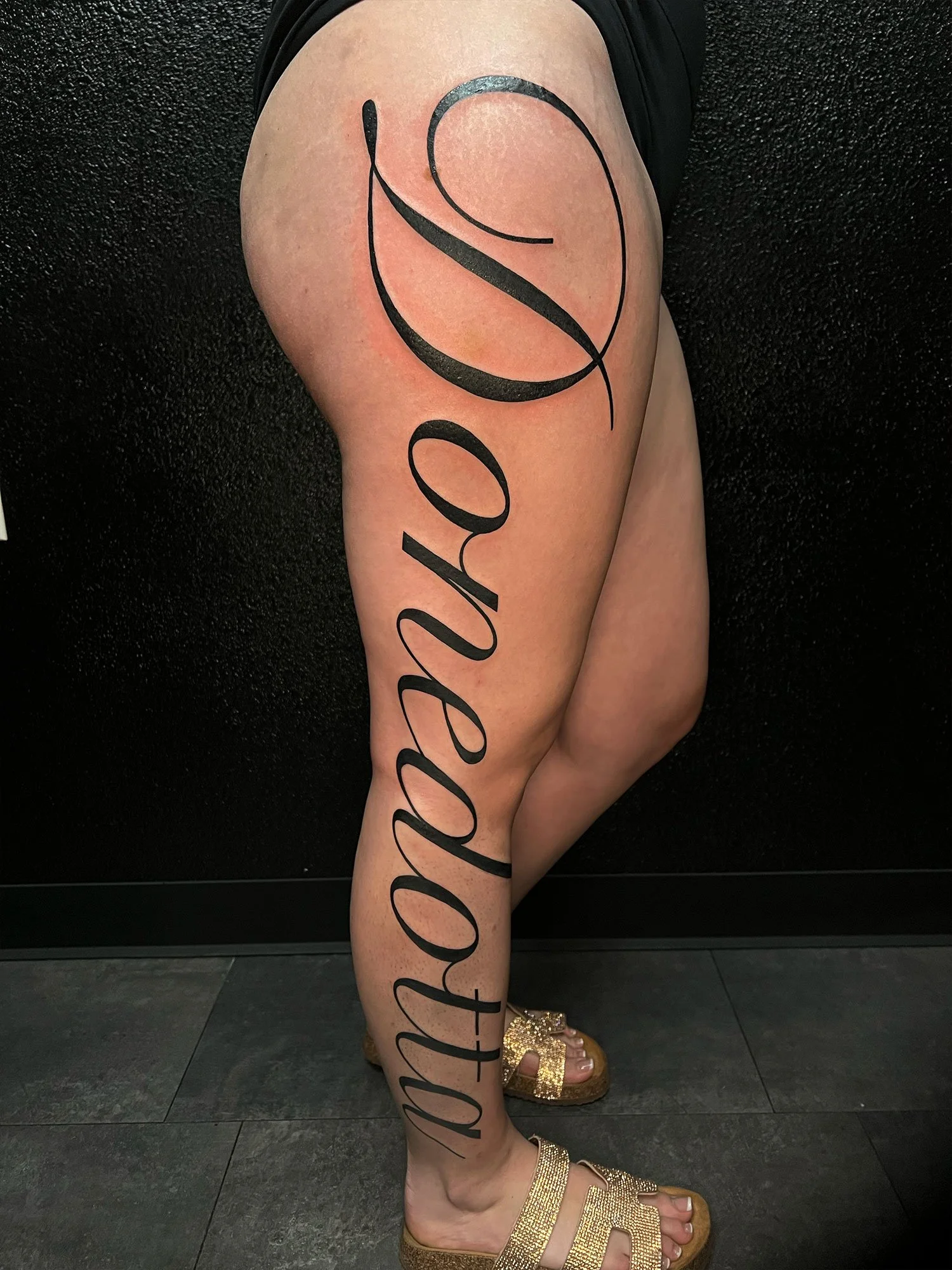 elizagreed-san-diego-black-grey-script-leg-tattoo.jpg
