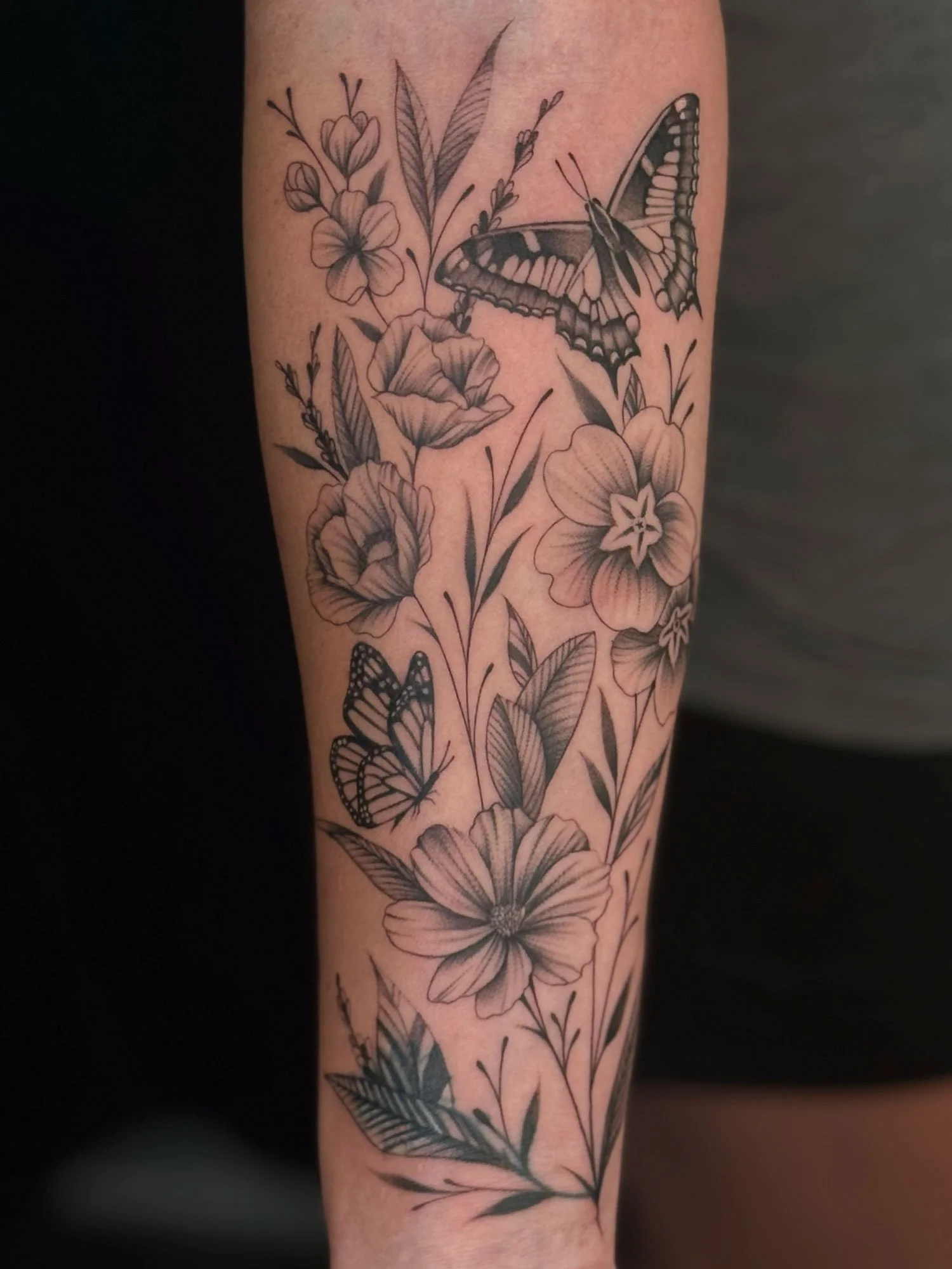 elizagreed-san-diego-black-grey-fineline-butterfly-floral-garden-tattoo.jpg