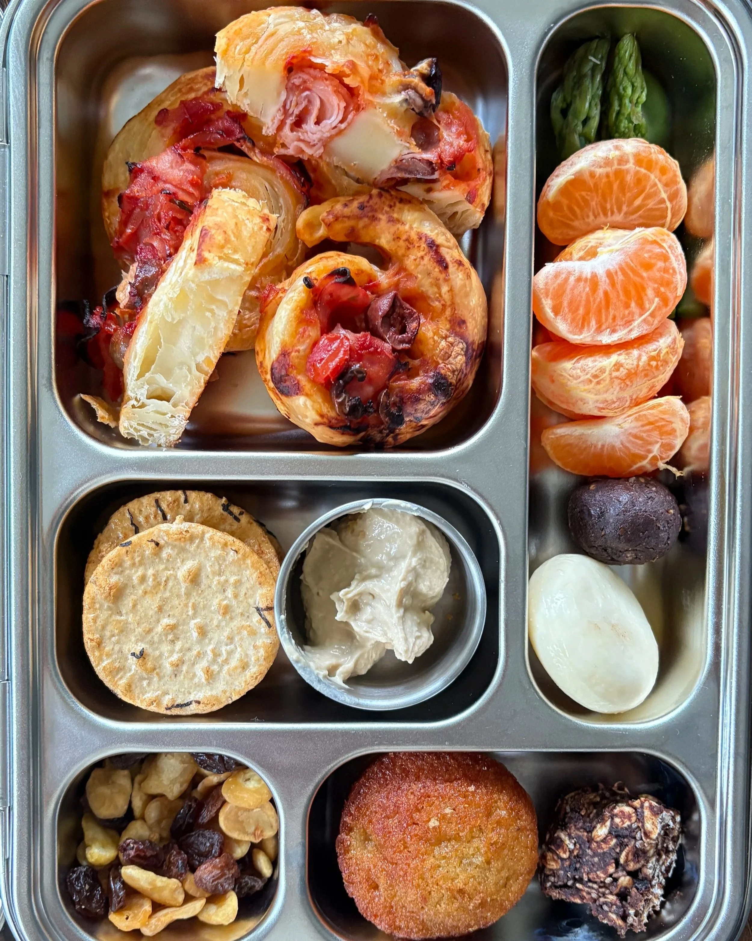 Kids lunchbox showing a variety of food and an iron source