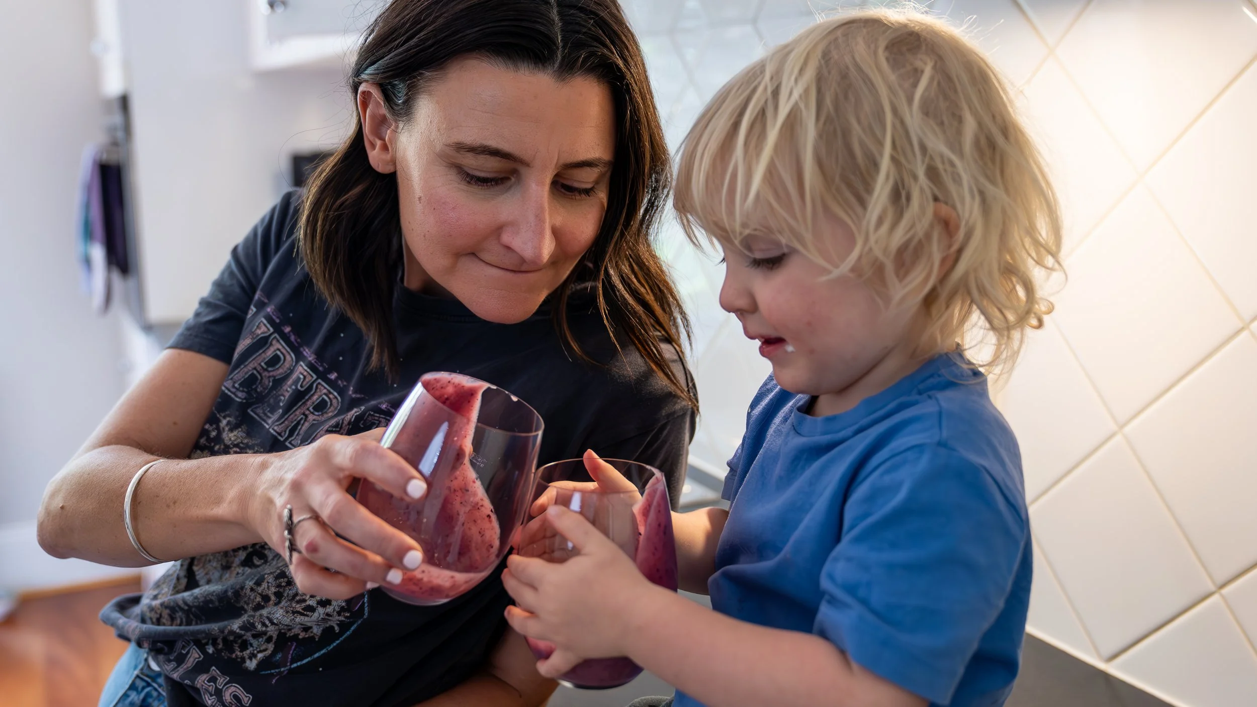 Noosa Nutritionist sharing iron rich smoothie with son
